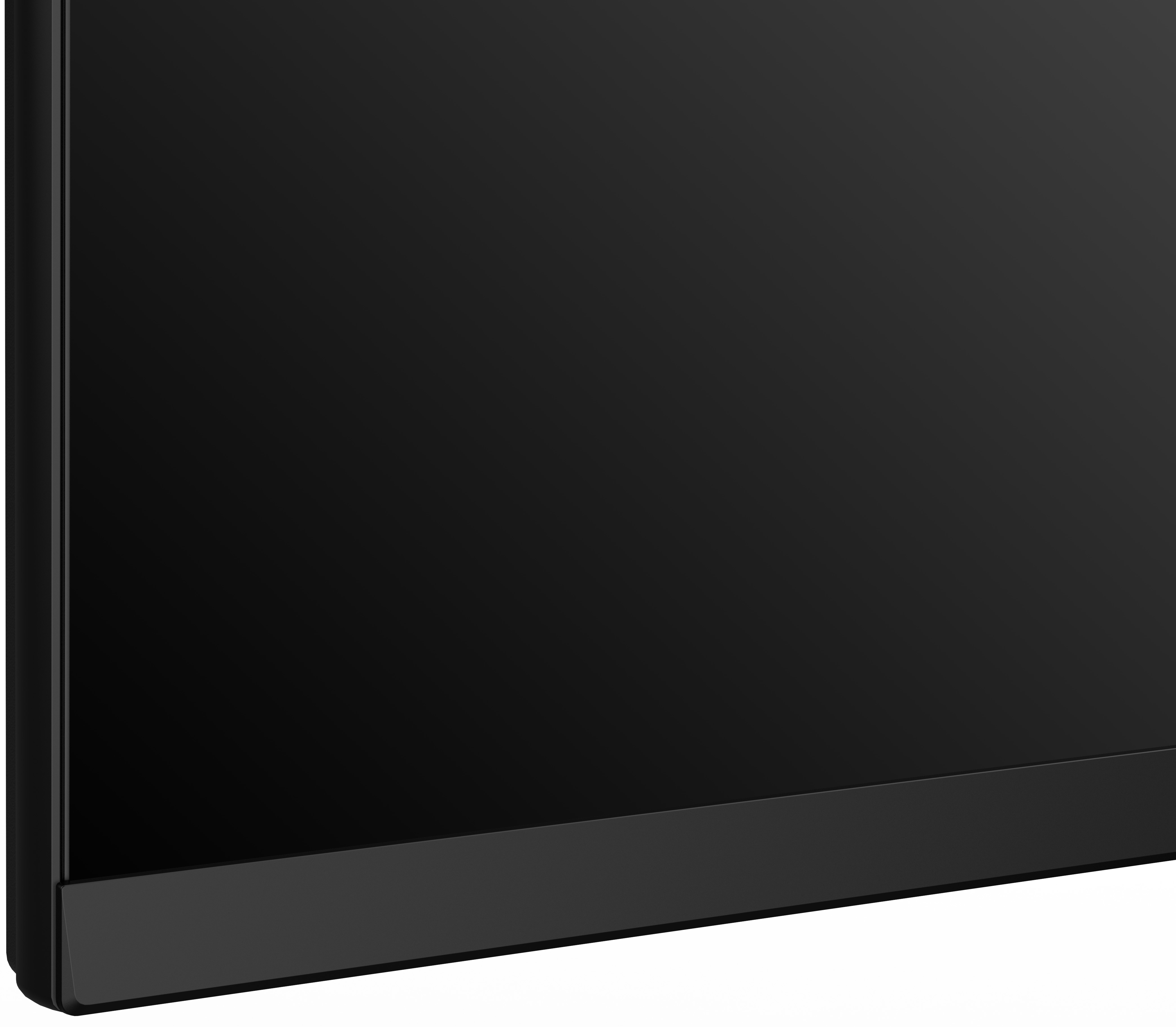 Un téléviseur noir brillant avec une lunette étroite et sombre.