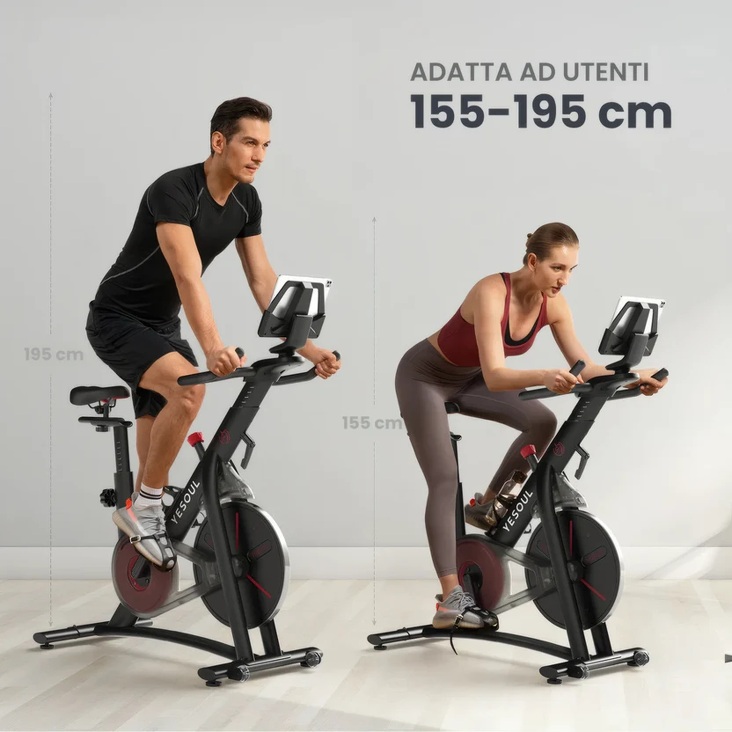 Uomo e donna su cyclette. Adatto per altezze 155-195 cm.