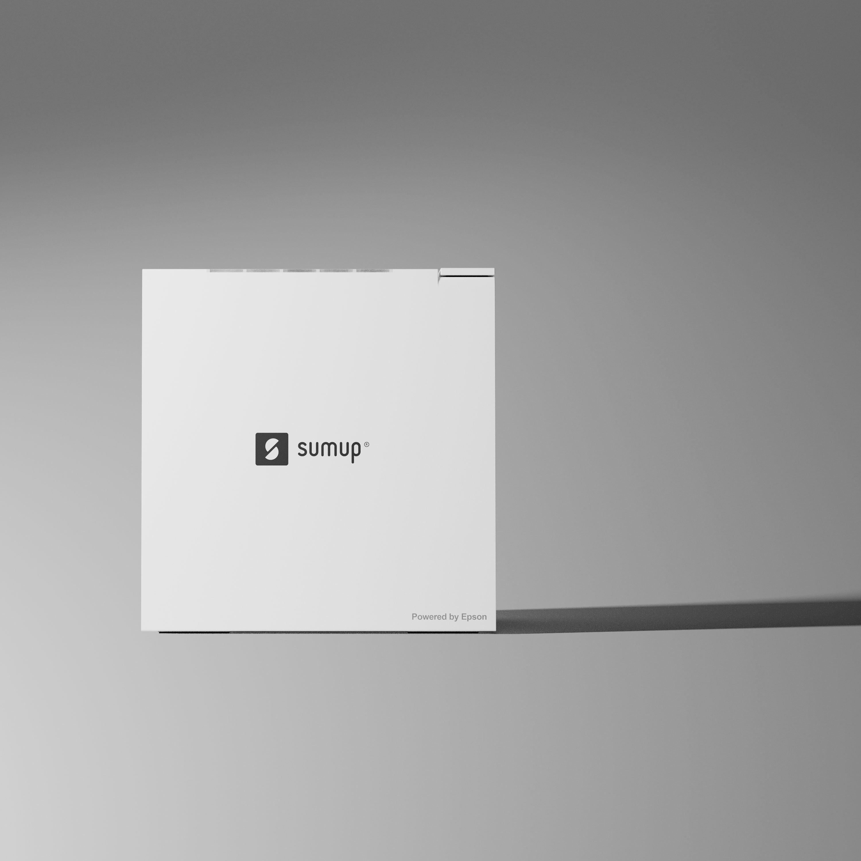 Ein weißes SumUp-Gerät mit Epson-Logo steht auf grauem Untergrund.