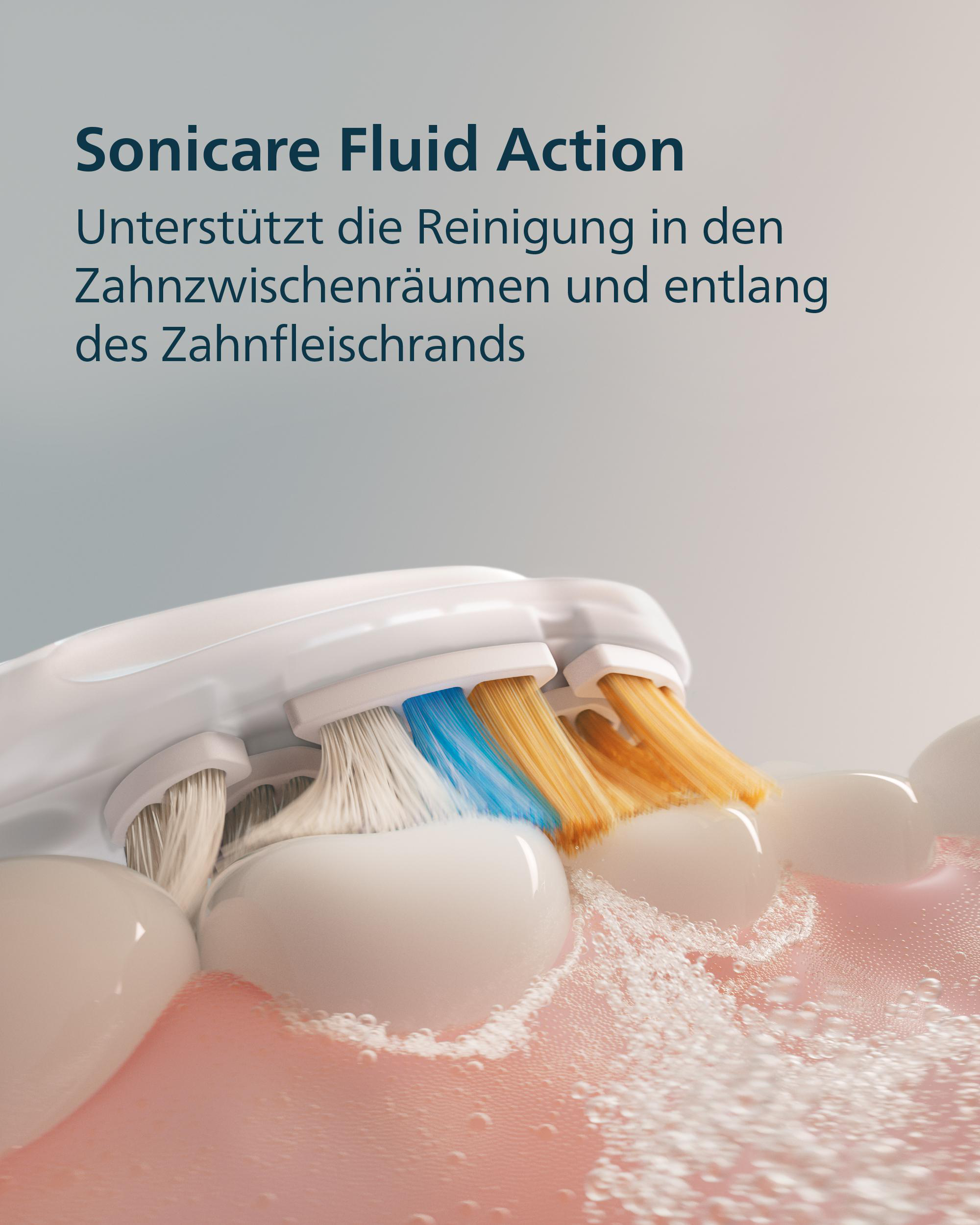 Elektrische Zahnbürste reinigt Zähne mit blauen und gelben Borsten in Schaum.