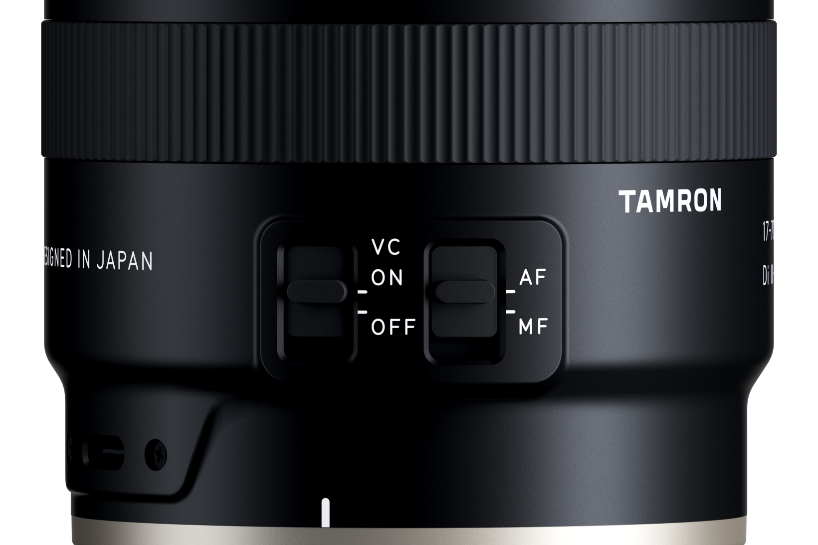 Nahaufnahme eines Tamron-Objektivs mit Schaltern für VC, AF und MF.