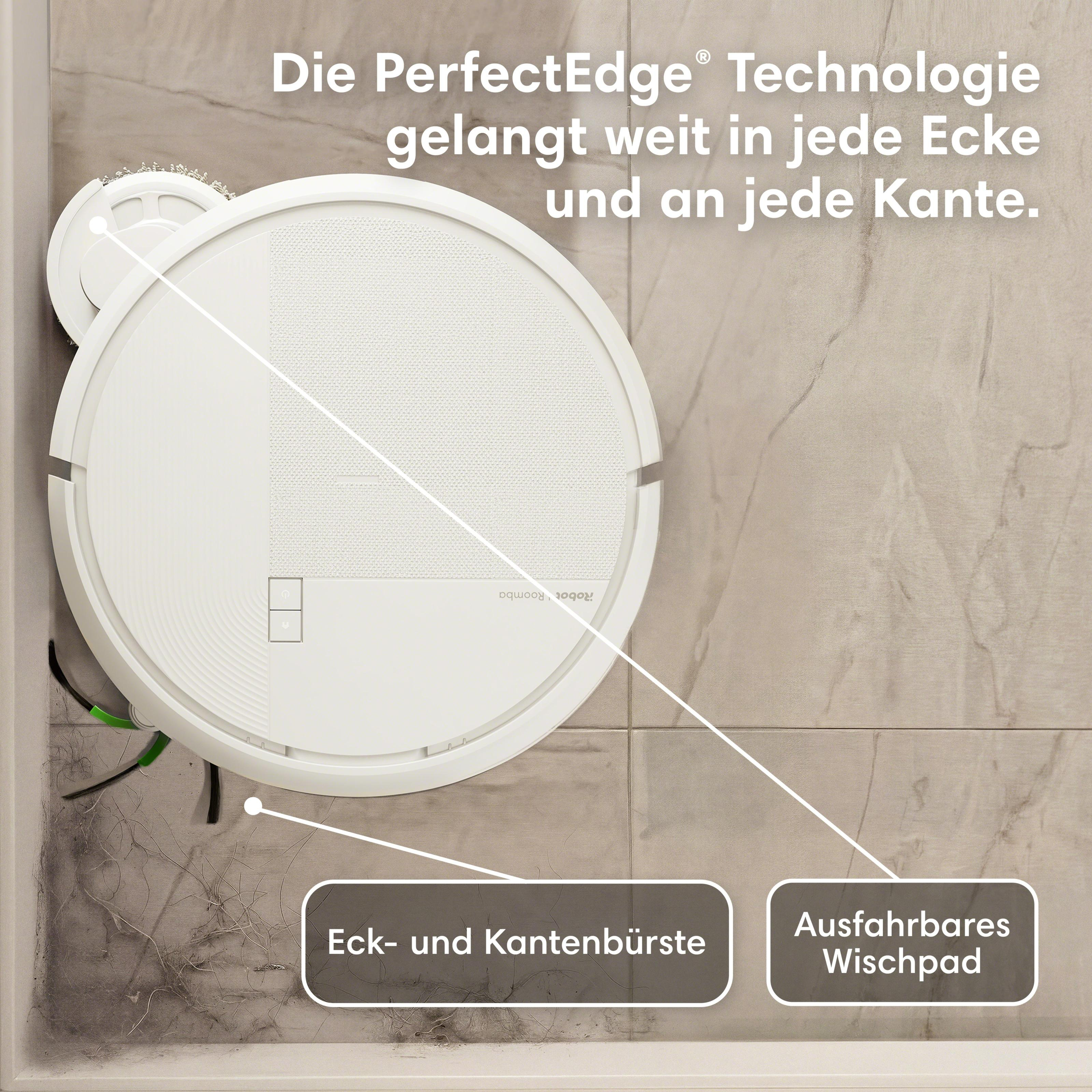 Ein weißer Saugroboter reinigt eine Ecke mit Haaren und Staub.