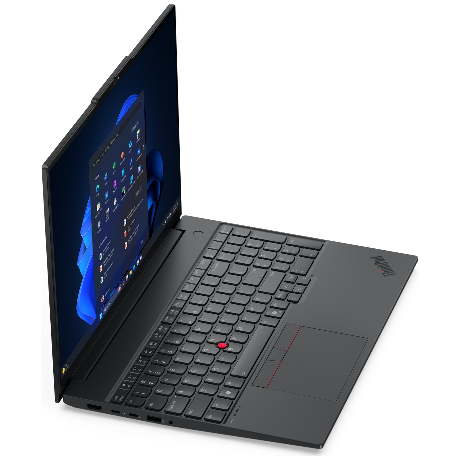 Black laptop with screen open showing a list of apps. Keyboard visible.