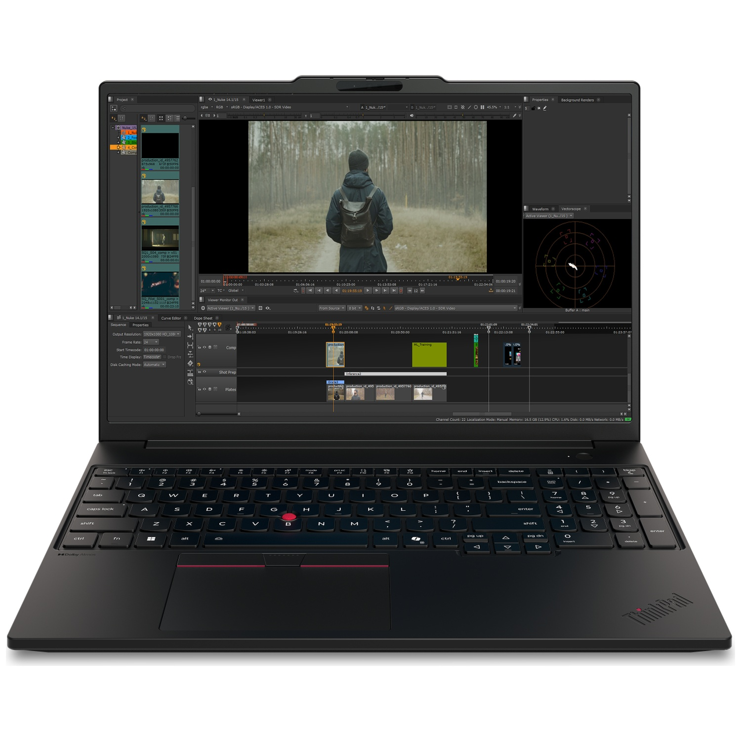 An open laptop displays video editing software showing a man in a forest.