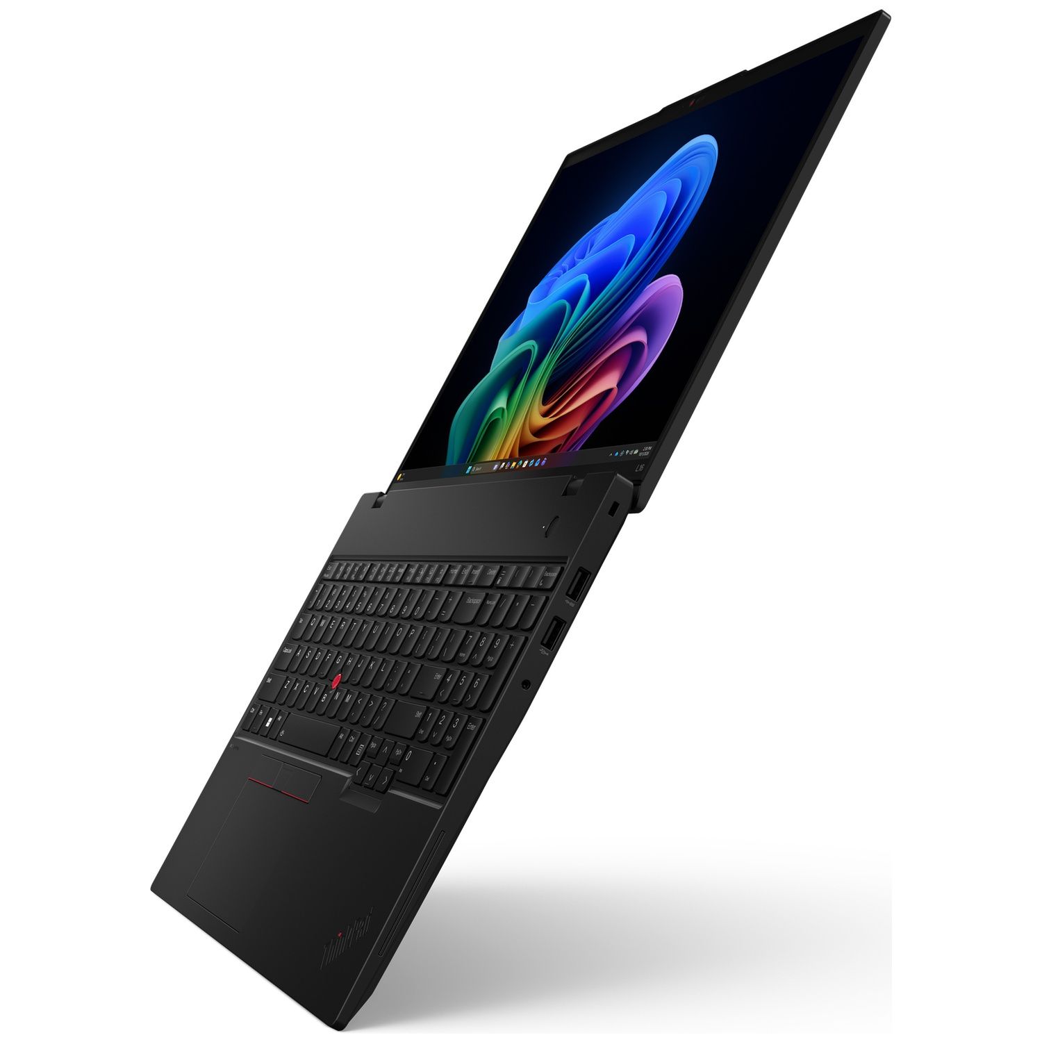 A black laptop with its screen open, displaying a colorful abstract wallpaper.