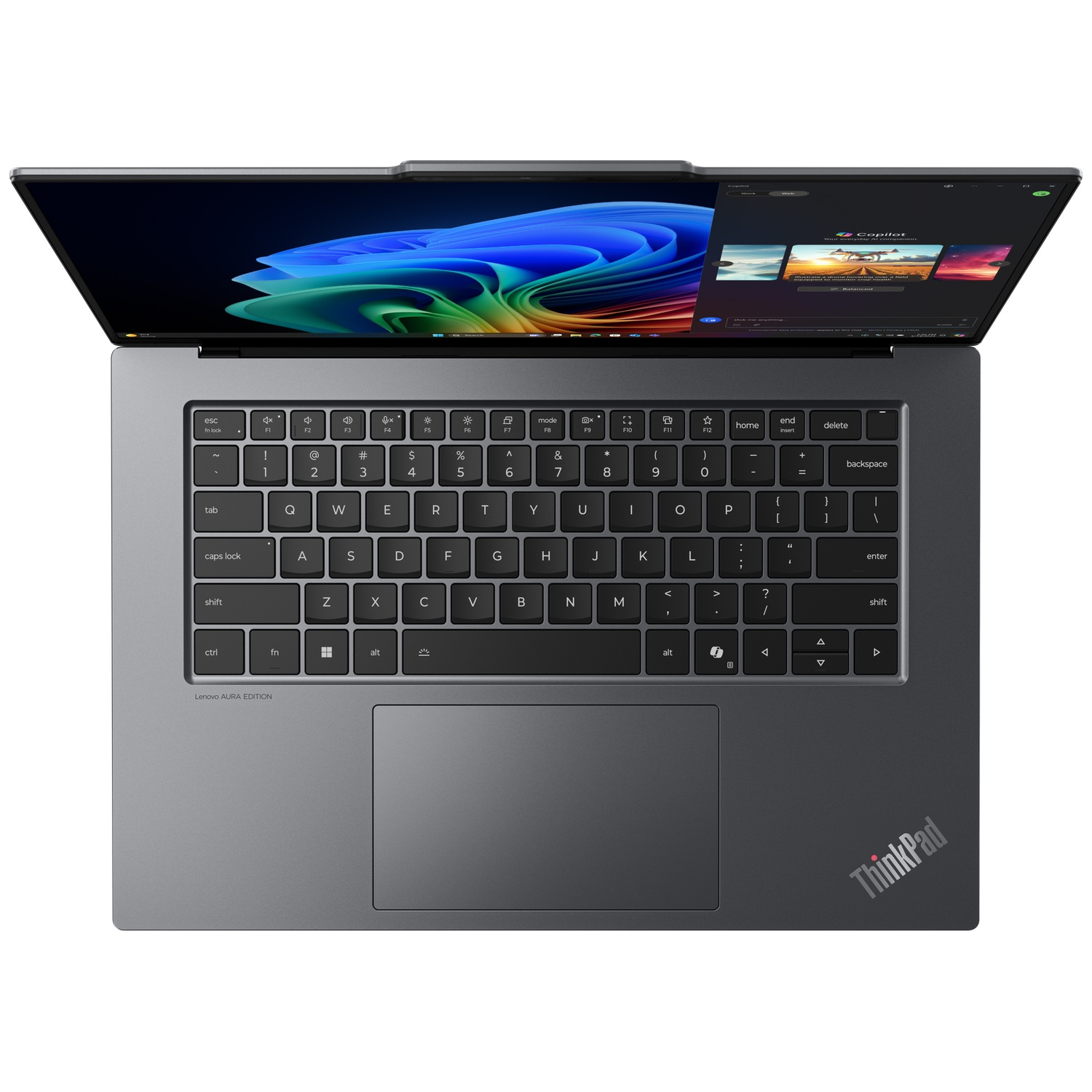 An open grey laptop displaying a colorful wallpaper on its screen.