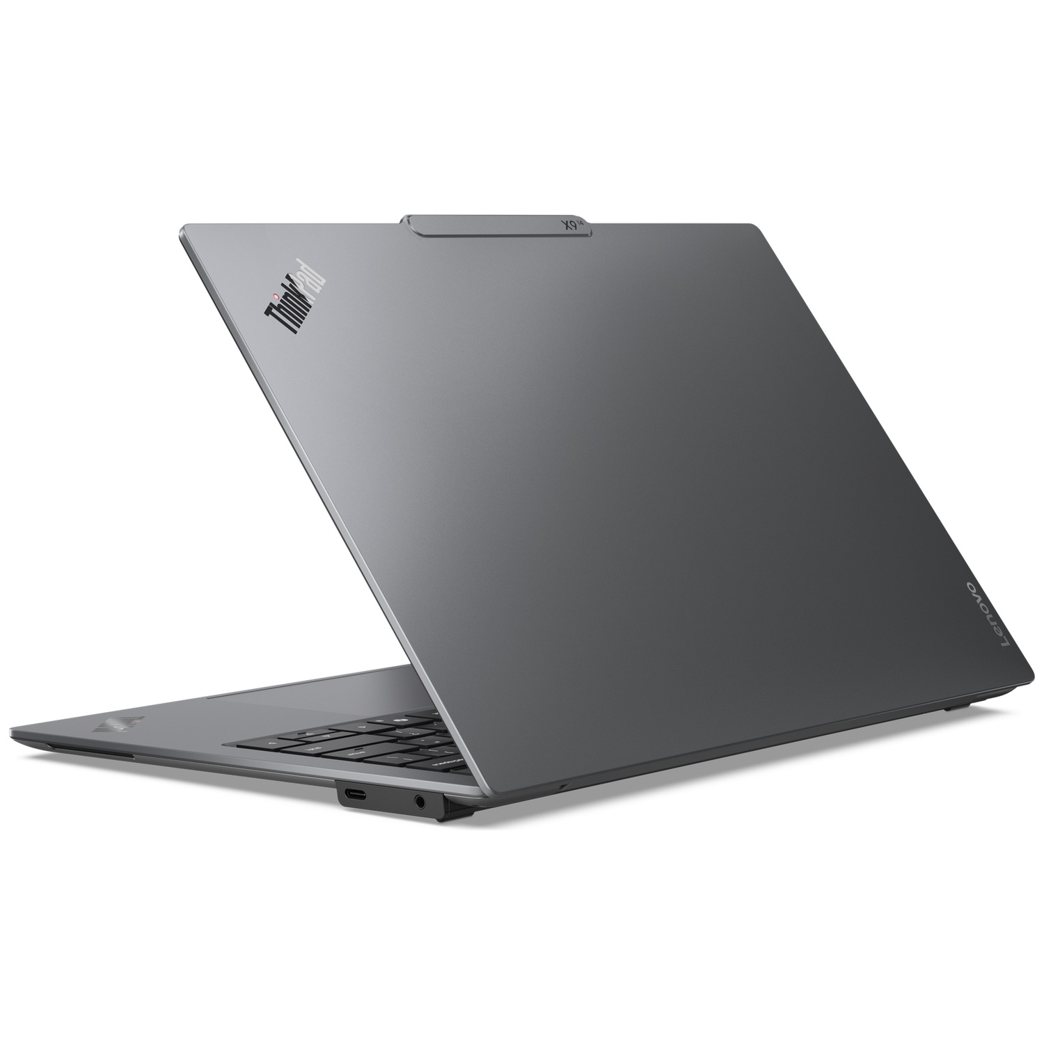 A grey Lenovo ThinkPad X1 laptop is shown open, viewed from the side at an angle.