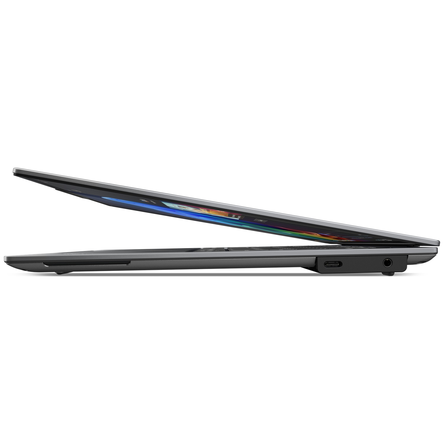 An open gray laptop featuring a USB-C port and headphone jack.
