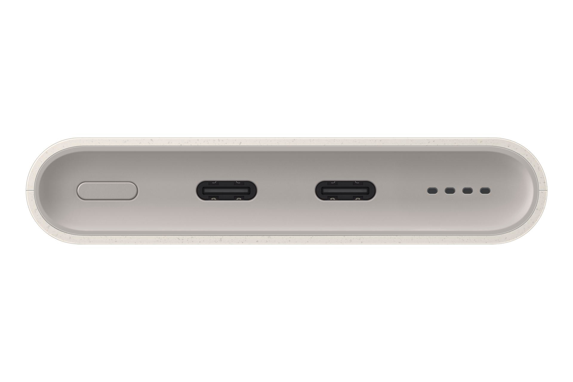 Ein hellgraues Powerbank mit zwei USB-C-Anschlüssen und vier Ladeanzeigen.