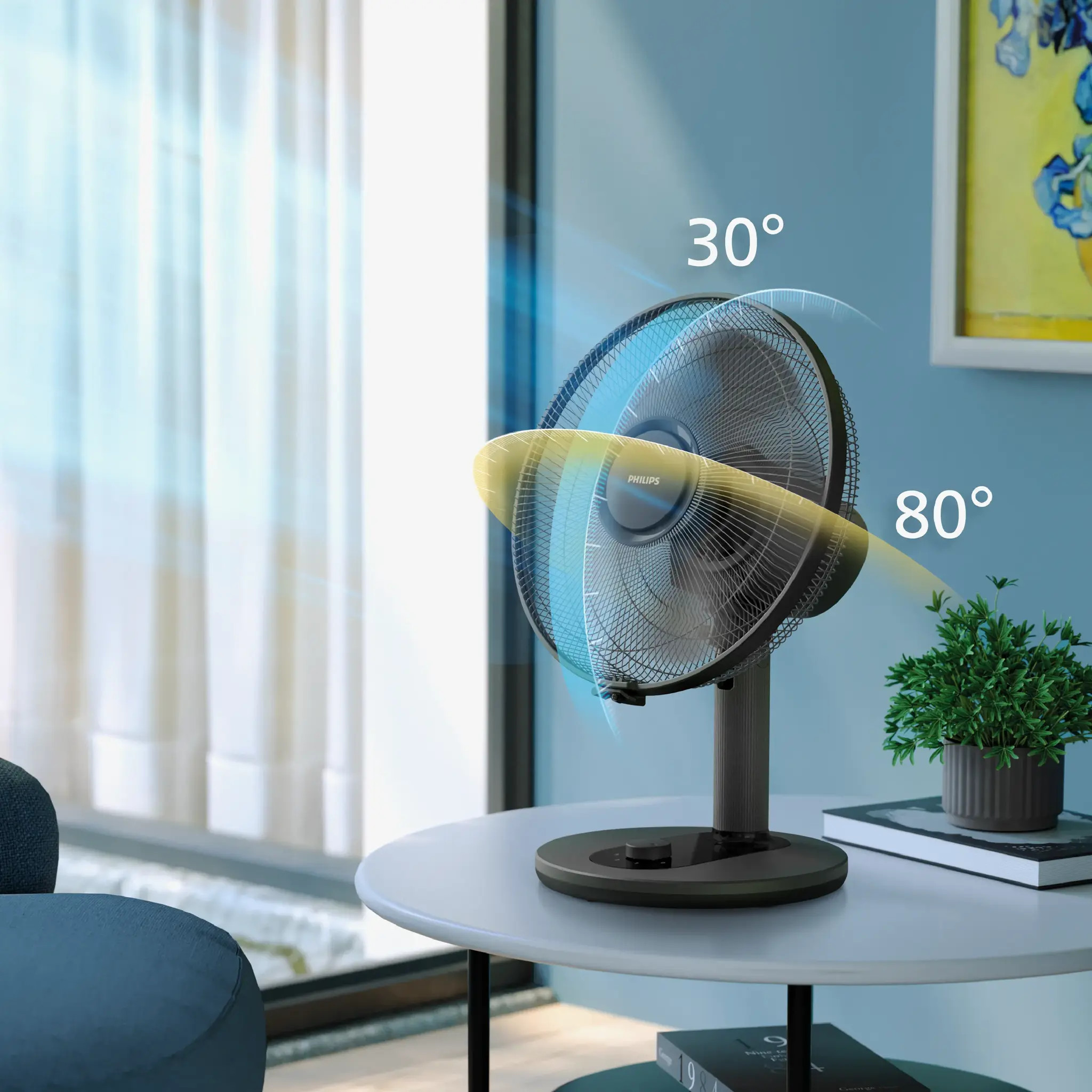 Wentylator z oscylacją 30° i 80° na stole.