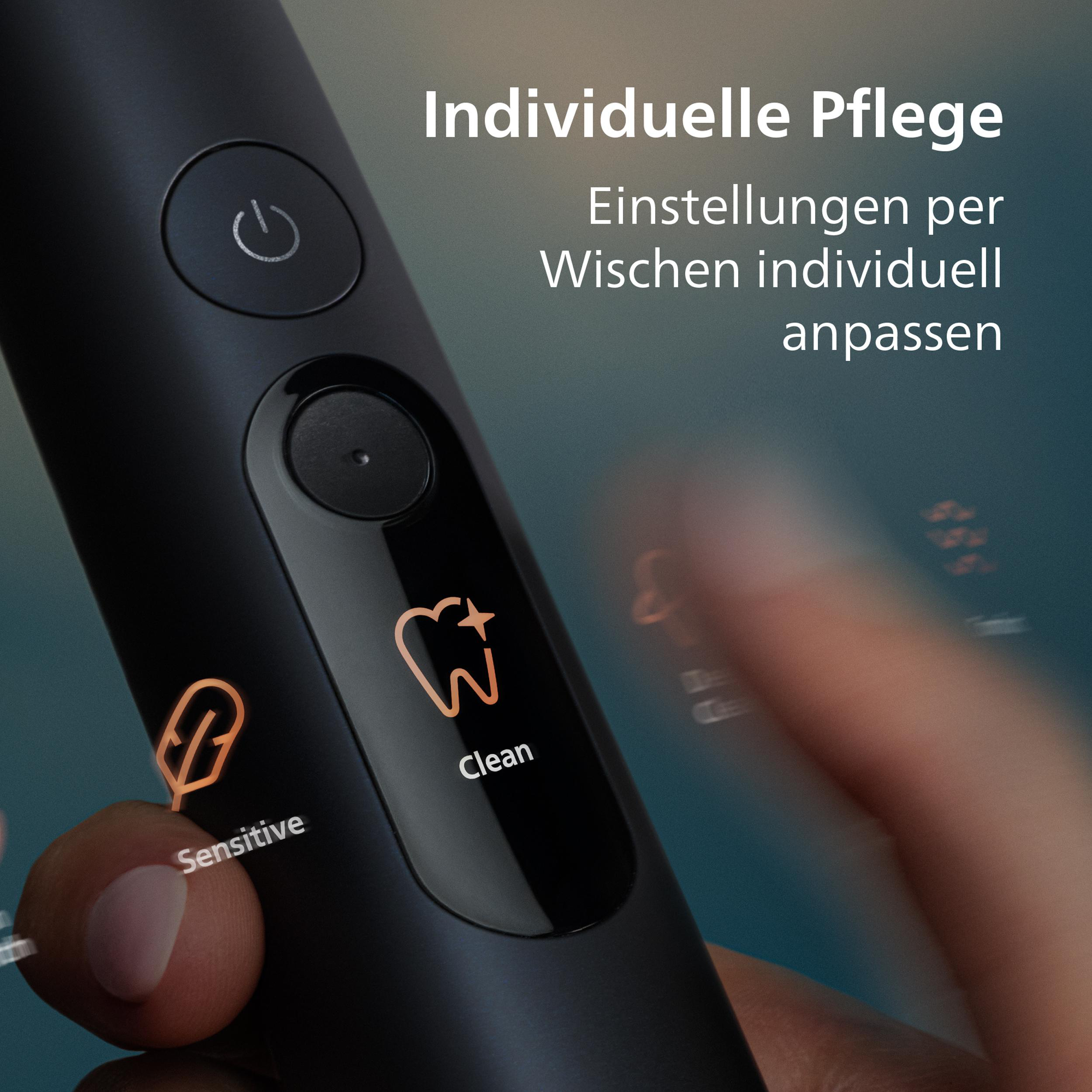 Schwarze Zahnbürste mit beleuchteten Symbolen für "Sensitive" und "Clean".