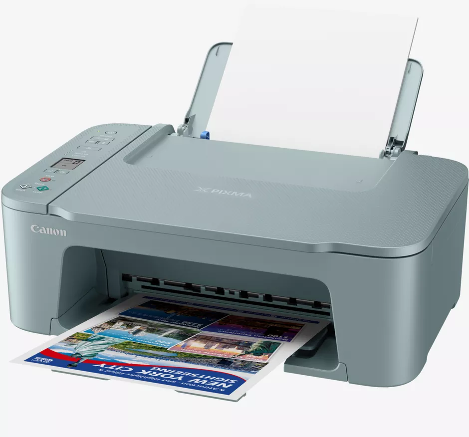 Ein grauer Canon Pixma Drucker druckt ein Blatt mit Bildern von New York City.