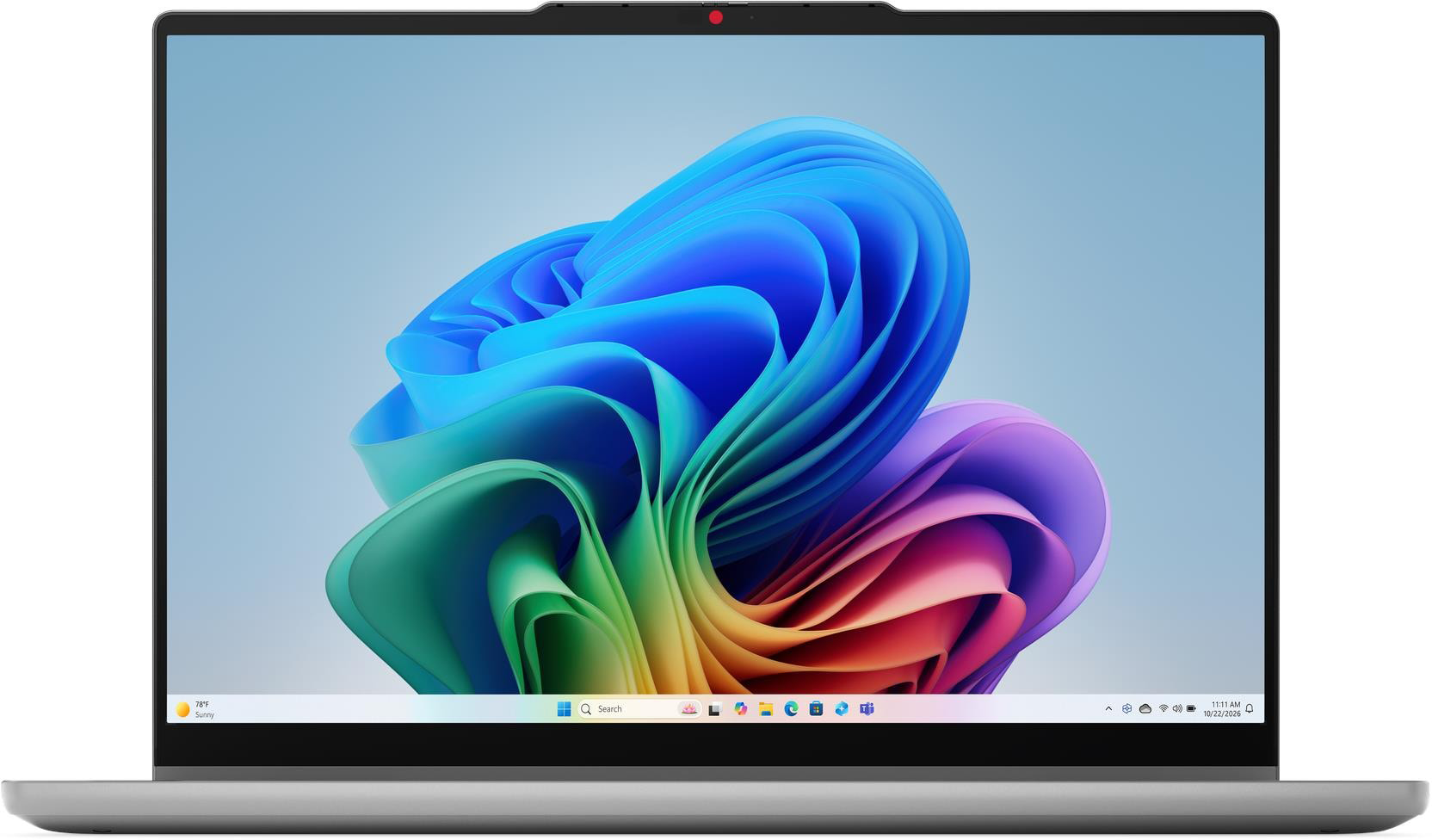Egy laptop színes, hullámszerű háttérképpel.