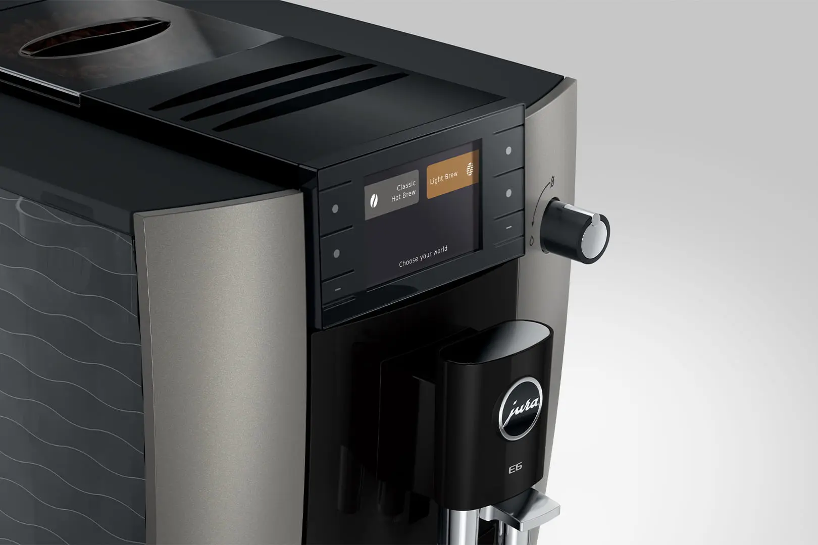 Un'elegante macchina da caffè con display touchscreen e quadrante rotante. Macchina da caffè con logo Jura.