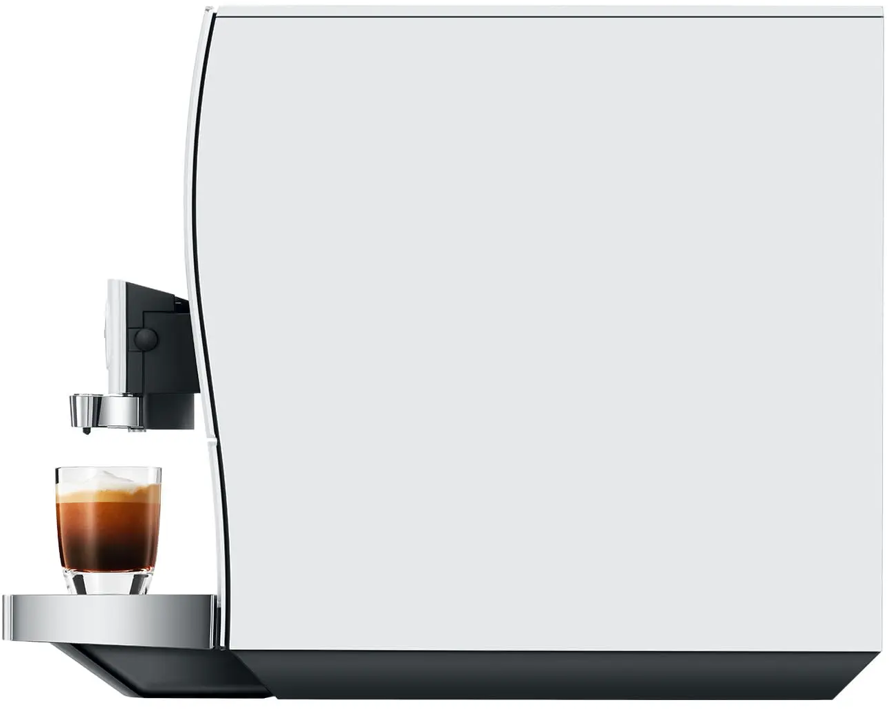 Una macchina da caffè bianca con un bicchiere di espresso accanto.