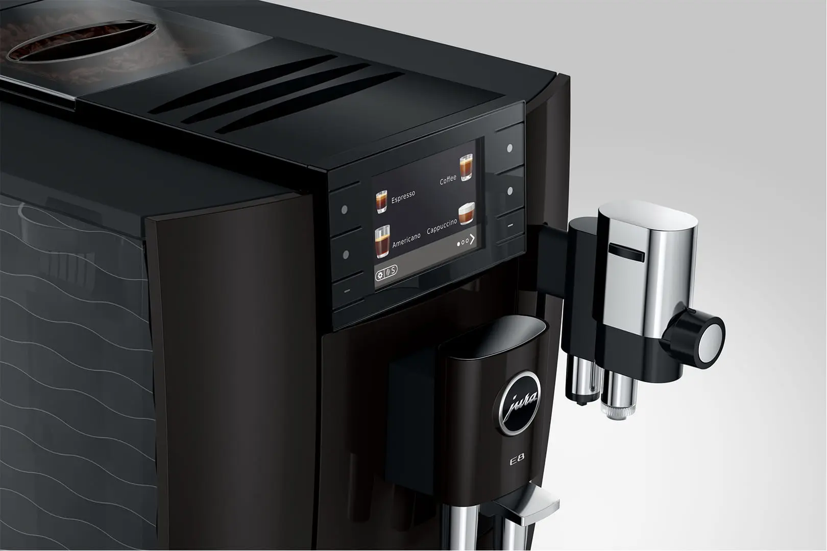 Macchina da caffè moderna con display touchscreen e beccuccio cromato.