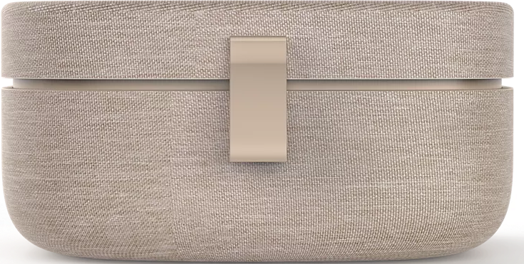 Eine beige Stoffbox mit einem helleren Verschluss oben.