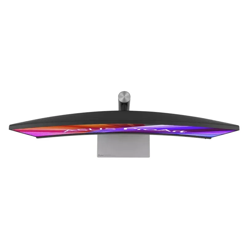 Un monitor curvo Asus ProArt con pantalla colorida y soporte plateado.