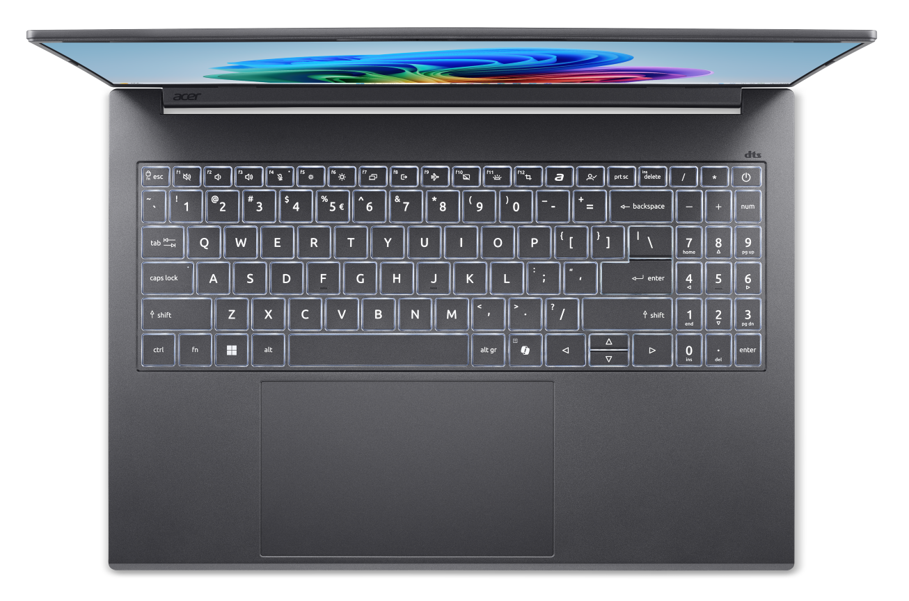 Otwarty laptop z podświetlaną klawiaturą i kolorową tapetą na ekranie.