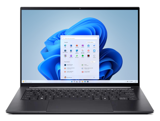 Otwarty laptop z systemem Windows 11 i niebieską tapetą z falami.