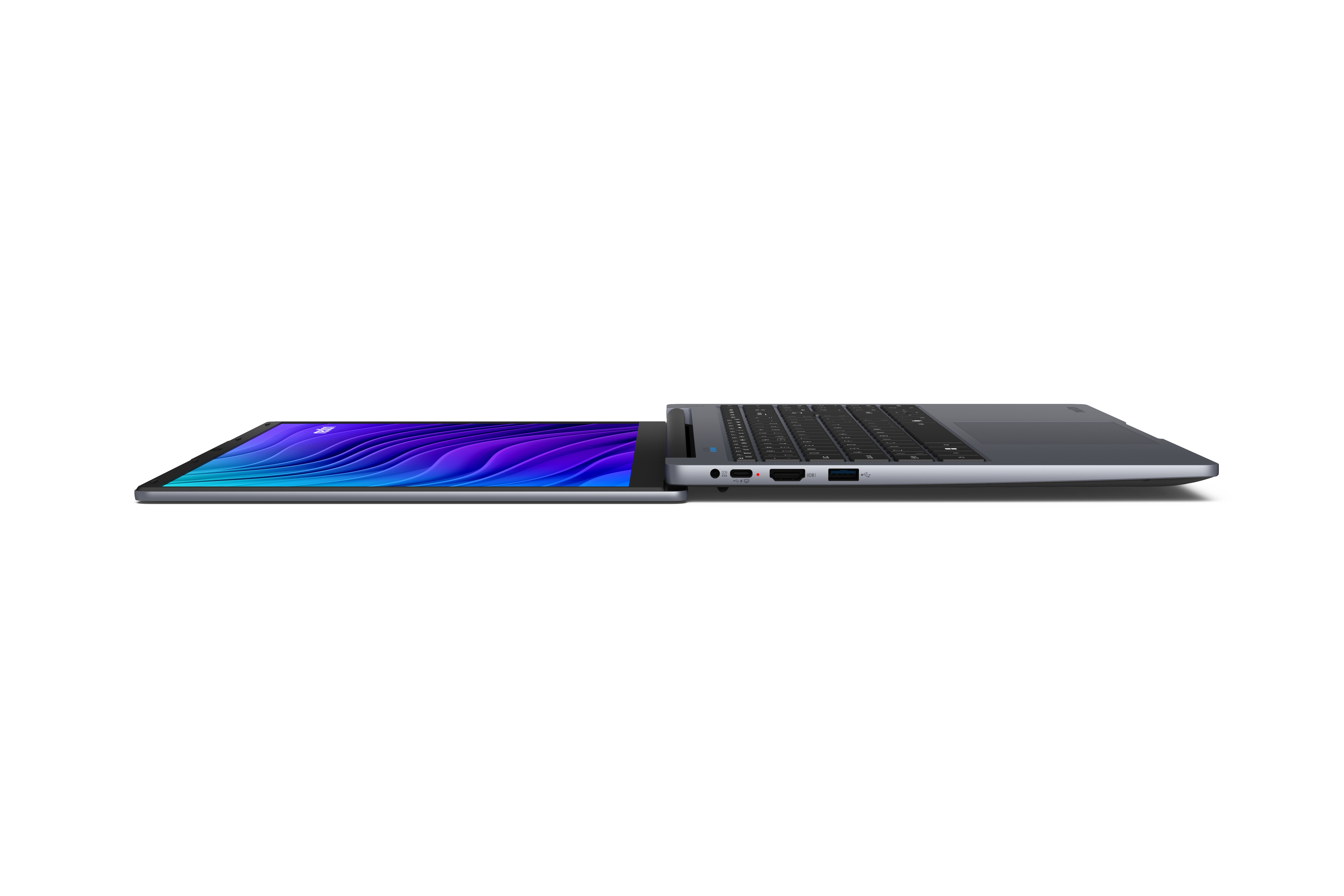 Ein graues Laptop mit einem blauen, wellenförmigen Hintergrund auf dem Bildschirm.