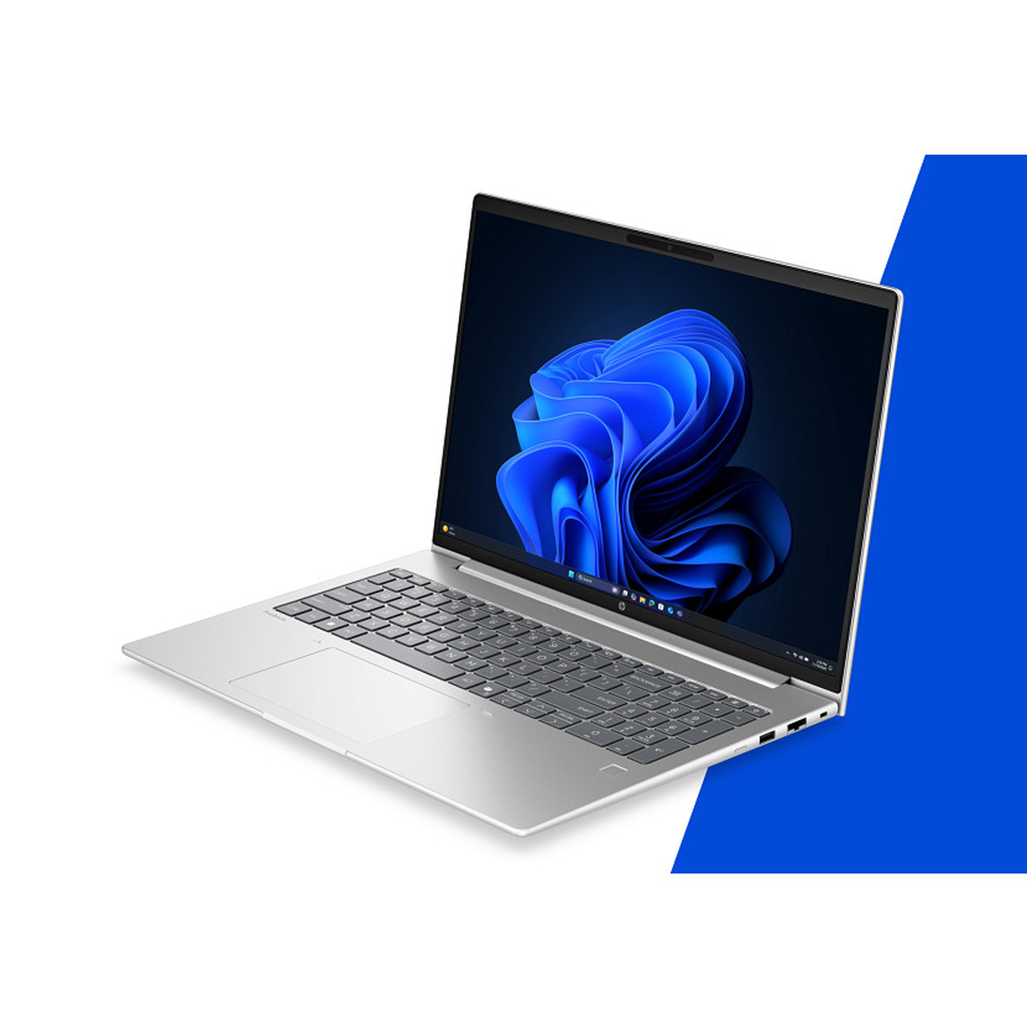 Een zilveren laptop met een blauw abstract behang op het scherm.