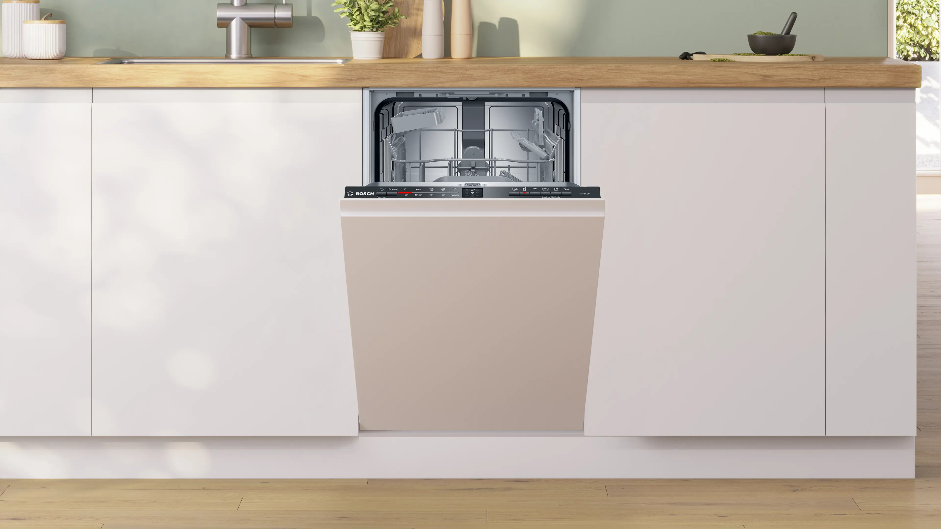Lavavajillas abierto en cocina moderna con frente blanco y encimera de madera.