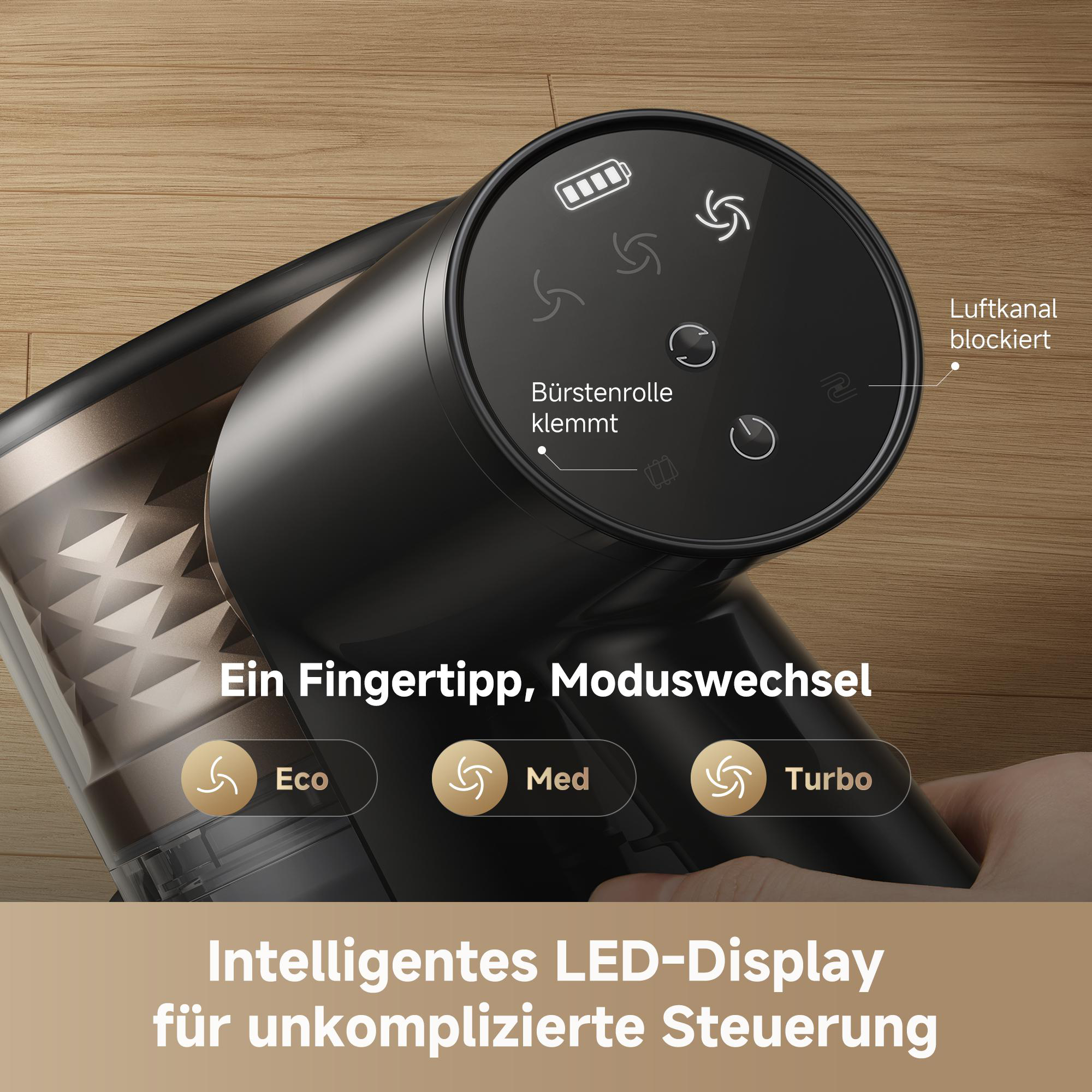 Ein schwarzer Handstaubsauger mit LED-Display auf Holzboden. Modi: Eco, Med, Turbo.