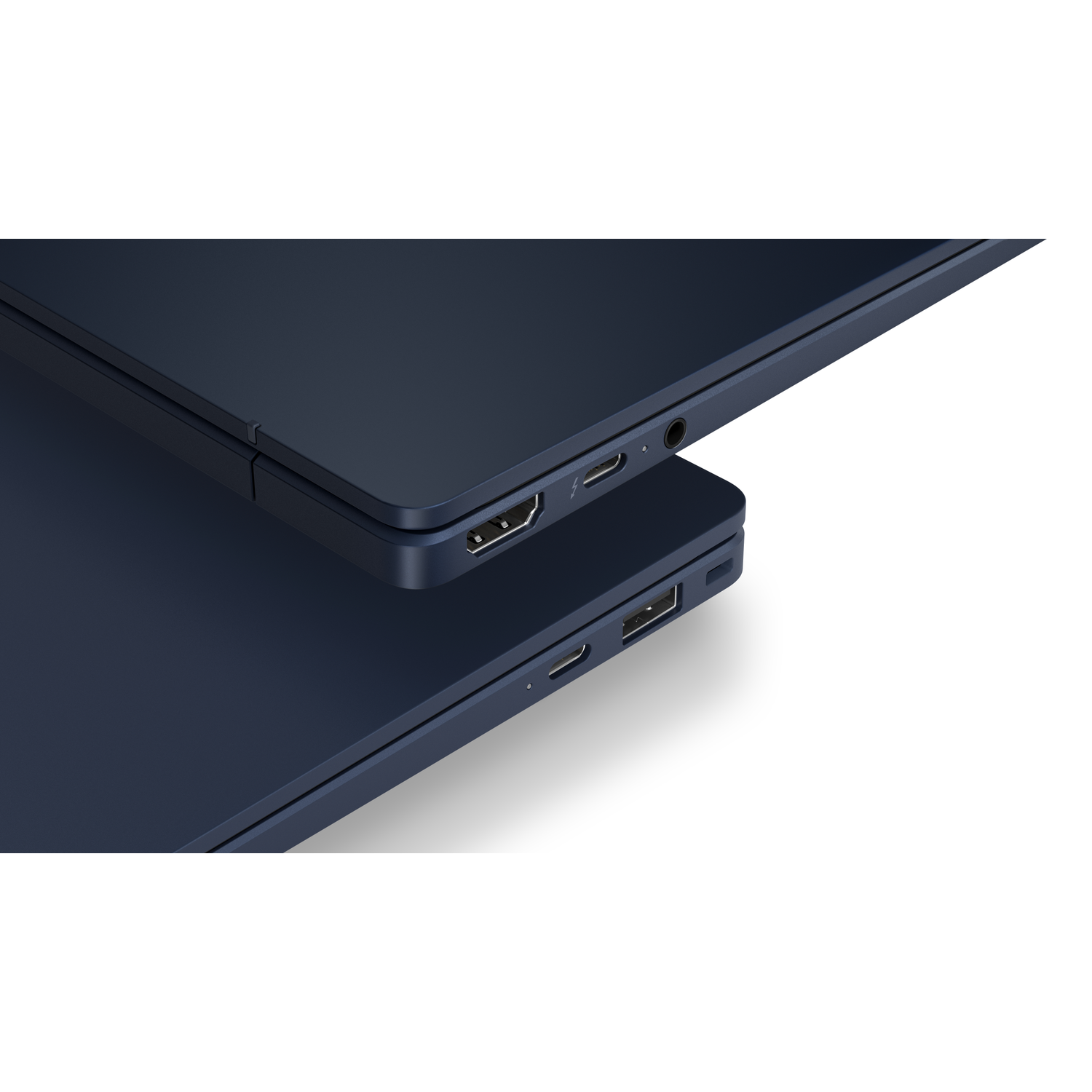 Donkerblauwe laptops, close-up van poorten: HDMI, USB-C, audio-aansluiting.