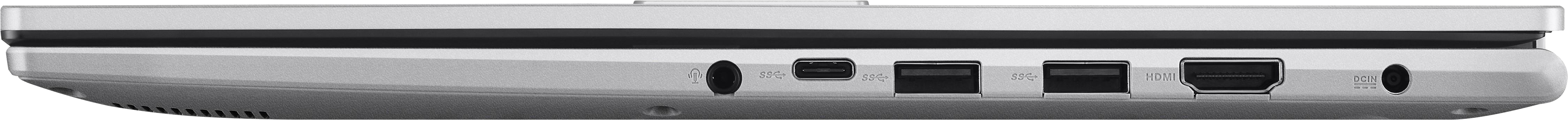 Ezüst laptop következő portokkal: fejhallgató, USB-C, USB-A, HDMI, tápellátás.