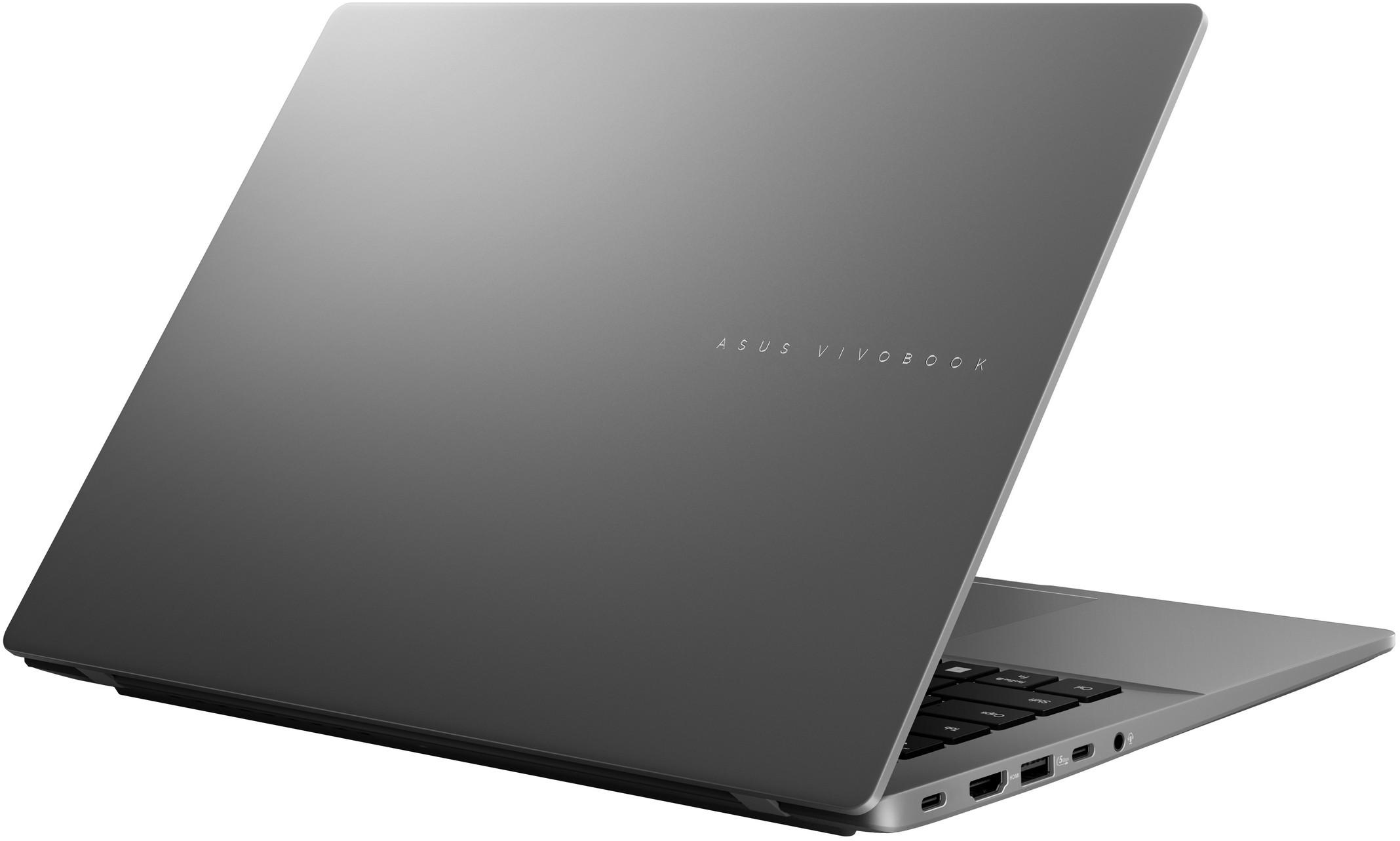 Zárt, szürke laptop Asus Vivobook logóval a fedelén.