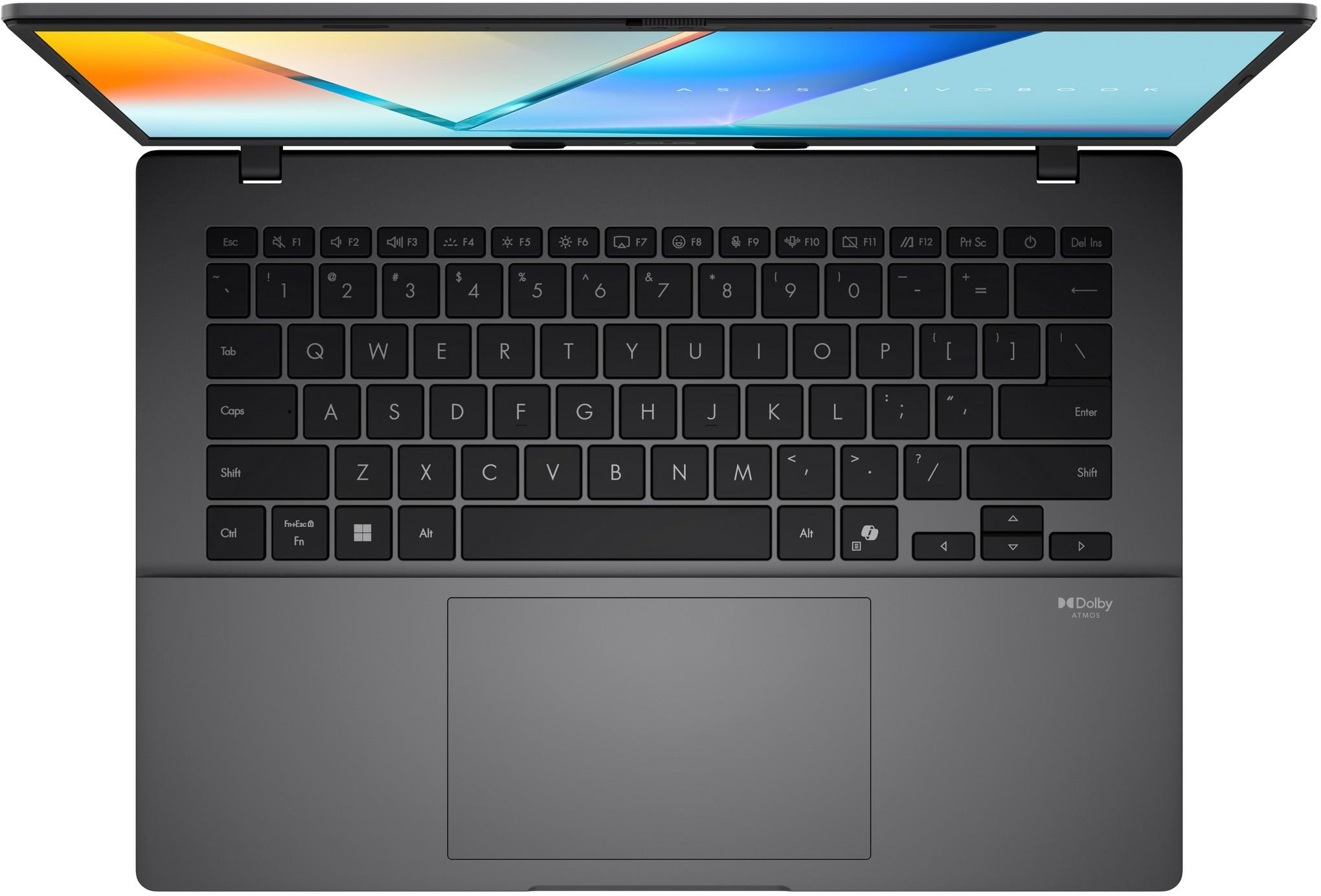 Egy sötétszürke laptop nyitva van, látható a billentyűzet és a színes háttérképes képernyő.