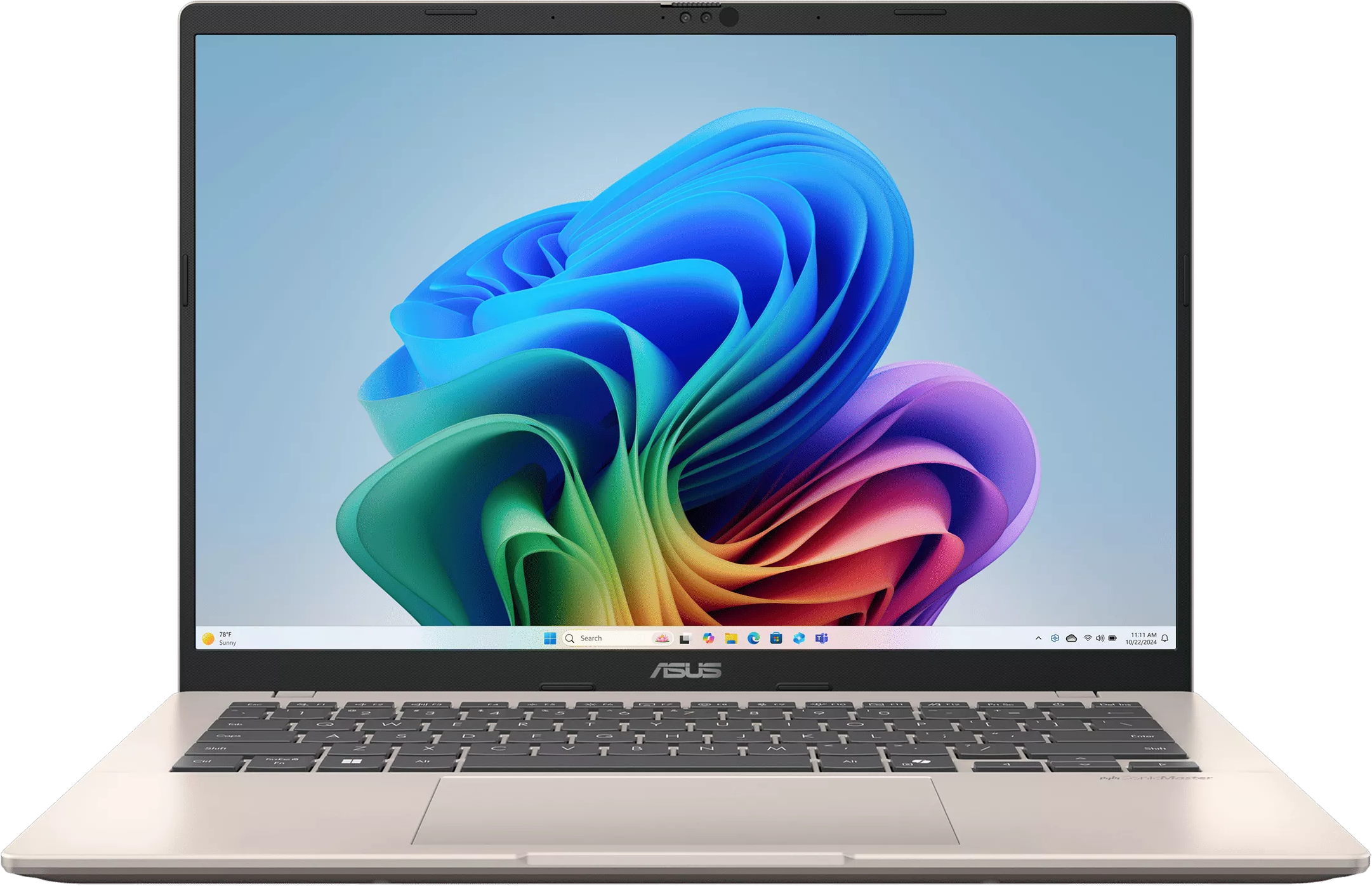 Világos bézs laptop színes háttérképpel és billentyűzettel.