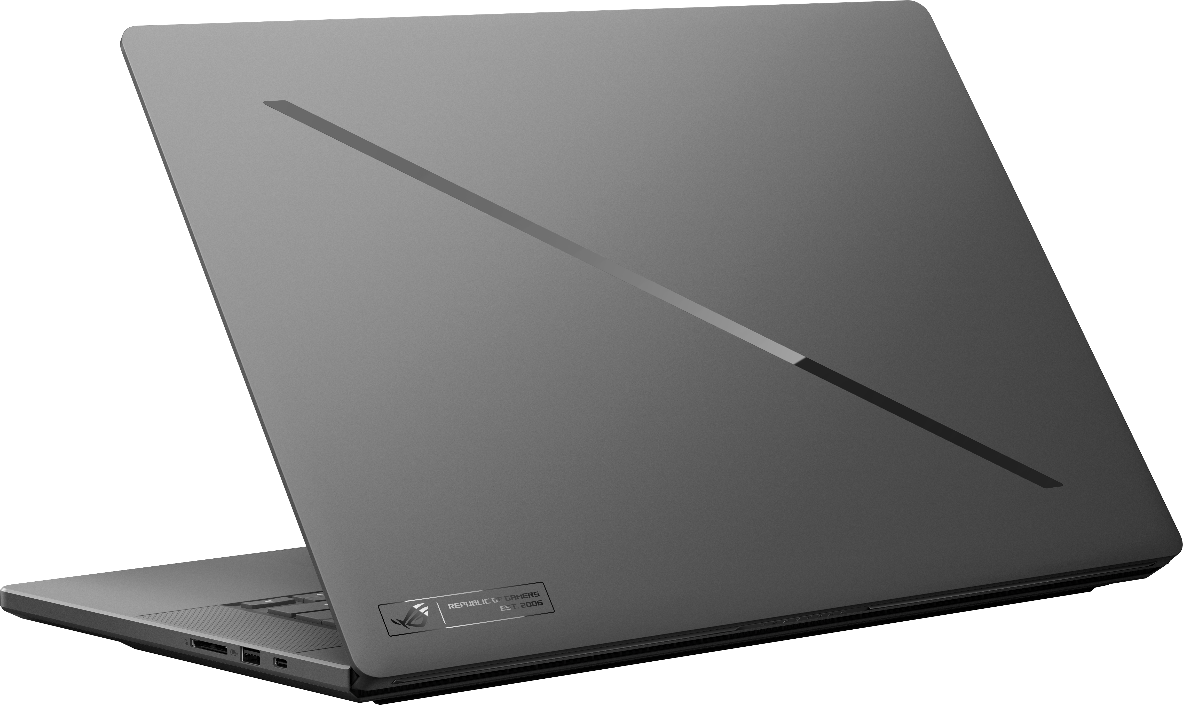 Un ordinateur portable gris fermé avec une rayure diagonale sur le capot.