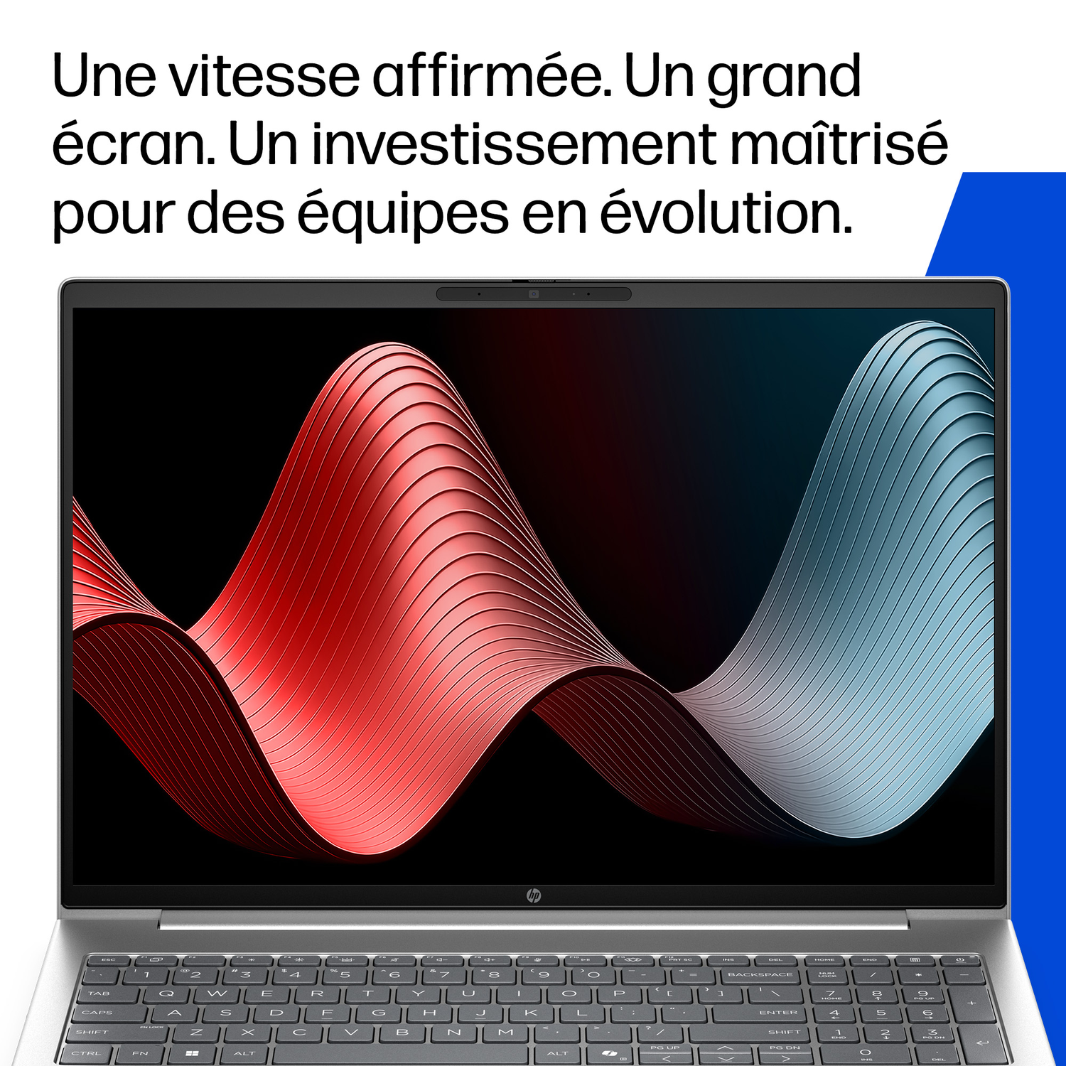 Un ordinateur portable affichant des lignes ondulées rouges et bleues abstraites.
