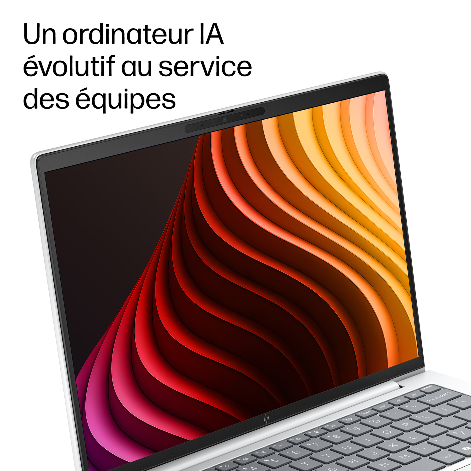 Un ordinateur portable affichant un fond coloré et ondulé et un clavier.