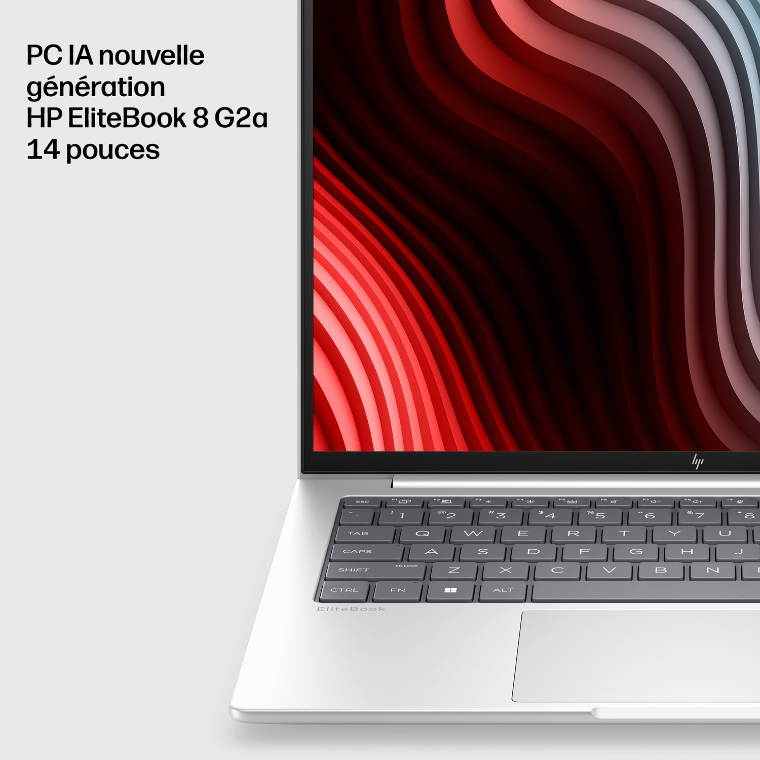 Un ordinateur portable HP EliteBook argenté avec un fond abstrait rouge et blanc sur son écran.