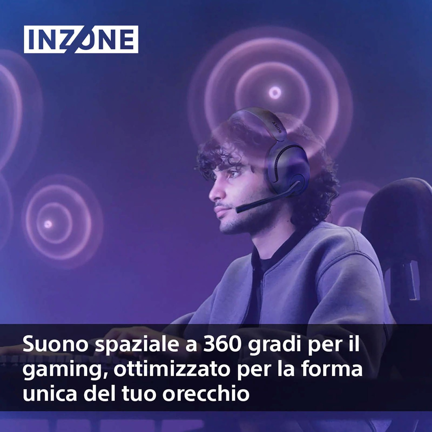 Uomo con cuffie, guarda uno schermo, con cerchi viola.