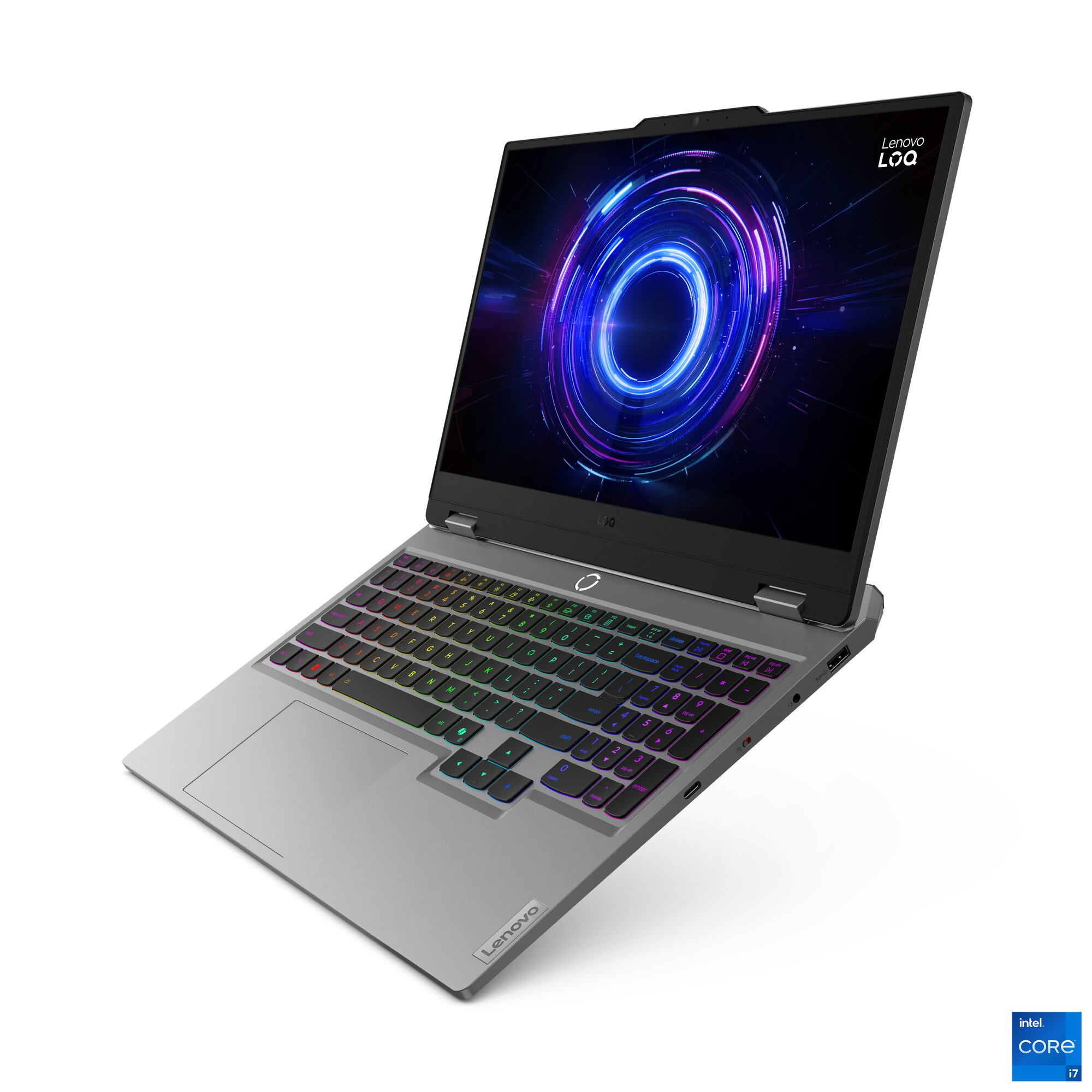 Gümüş rengi, arkadan aydınlatmalı klavyeli ve ekranda dijital halkalı laptop.