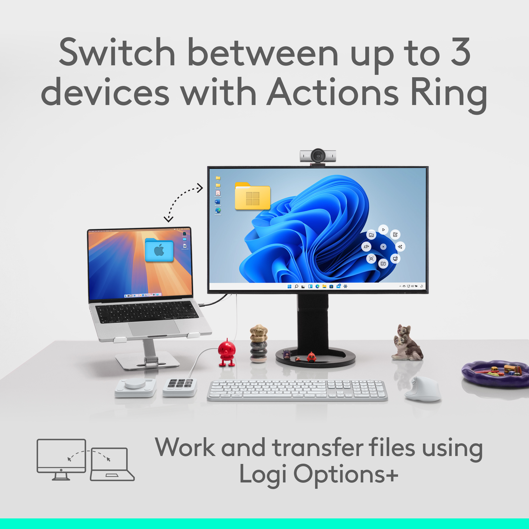 Un ordinateur portable et un moniteur sont sur un bureau avec clavier et souris à proximité.