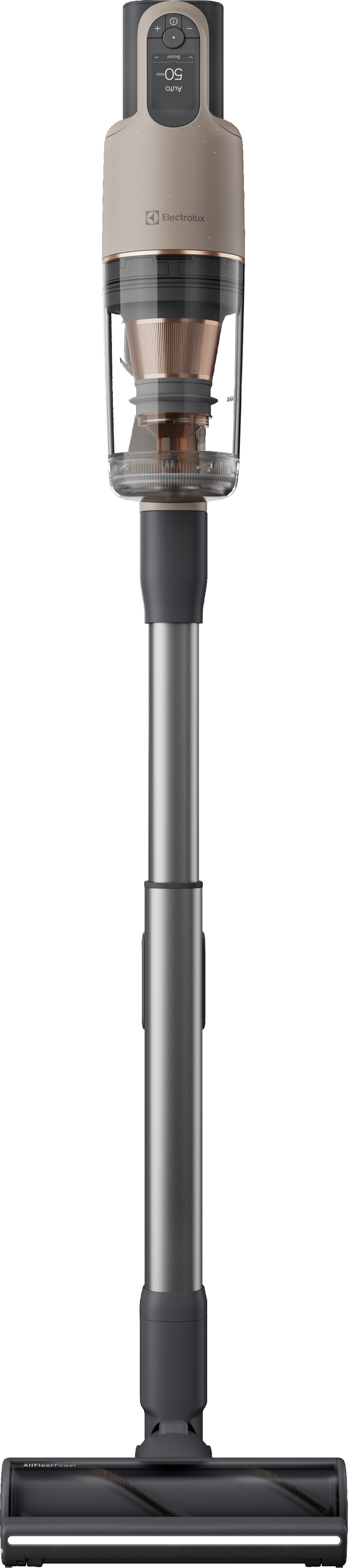 Un aspirapolvere portatile grigio polvere e oro con contenitore trasparente e display.