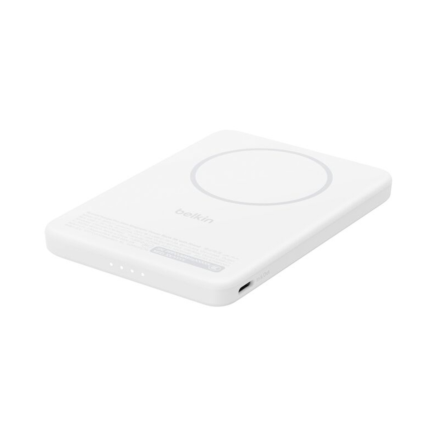 Un caricabatterie Belkin bianco con un cerchio sopra e porte sul lato.