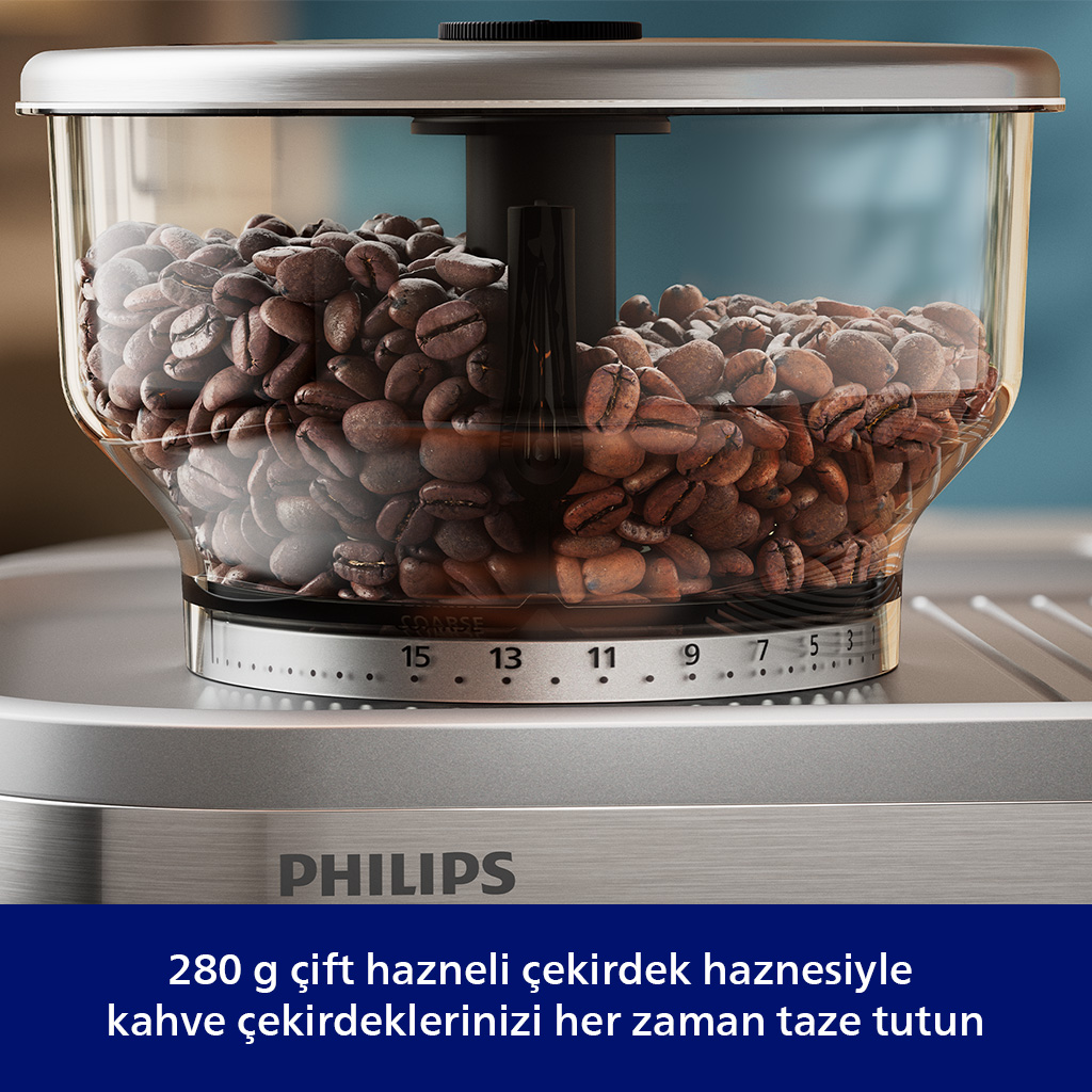 PHILIPS logosu ve öğütme ayarları olan şeffaf hazne içinde kahve çekirdekleri.