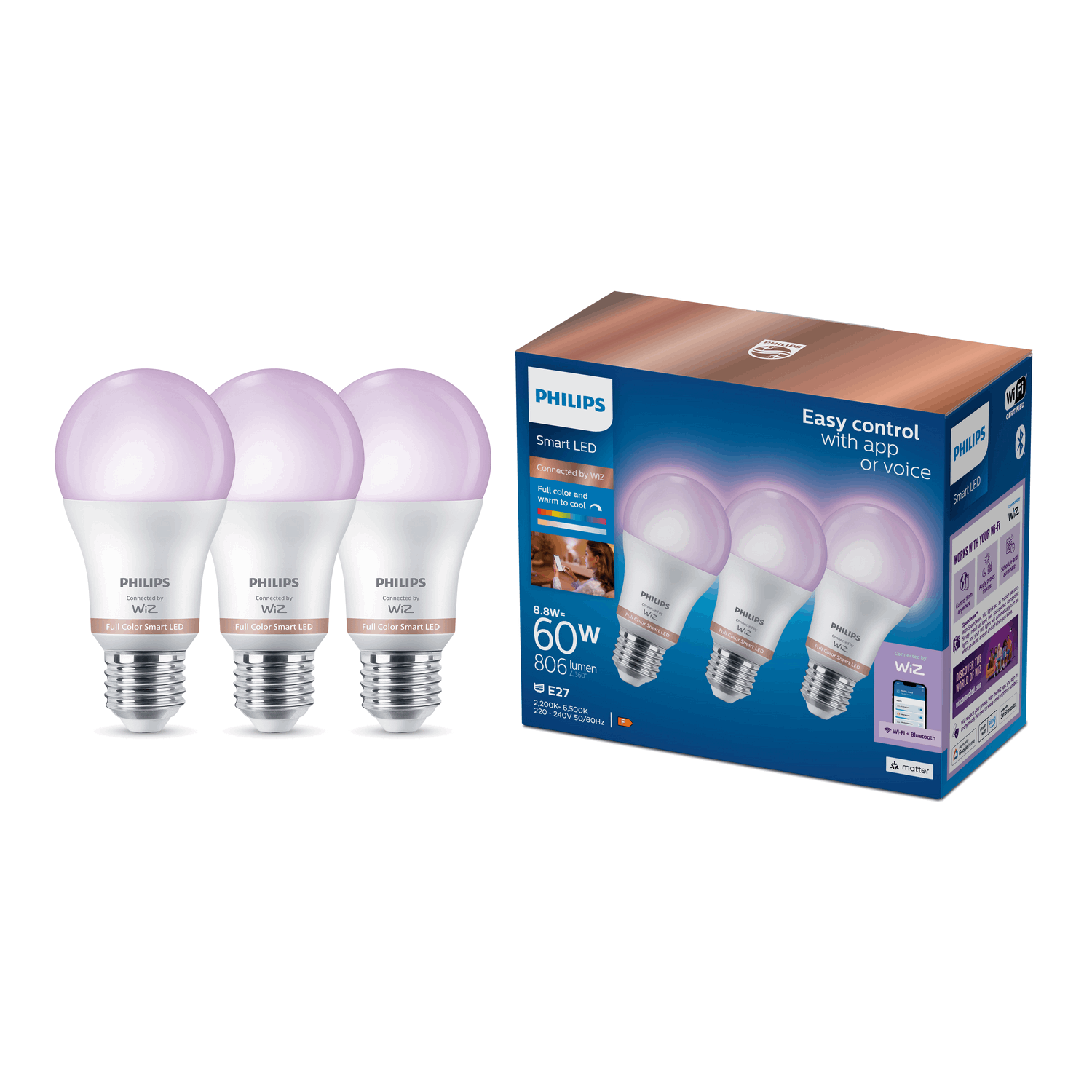 Tres bombillas LED inteligentes Philips y su embalaje. Las bombillas brillan en un suave lila.