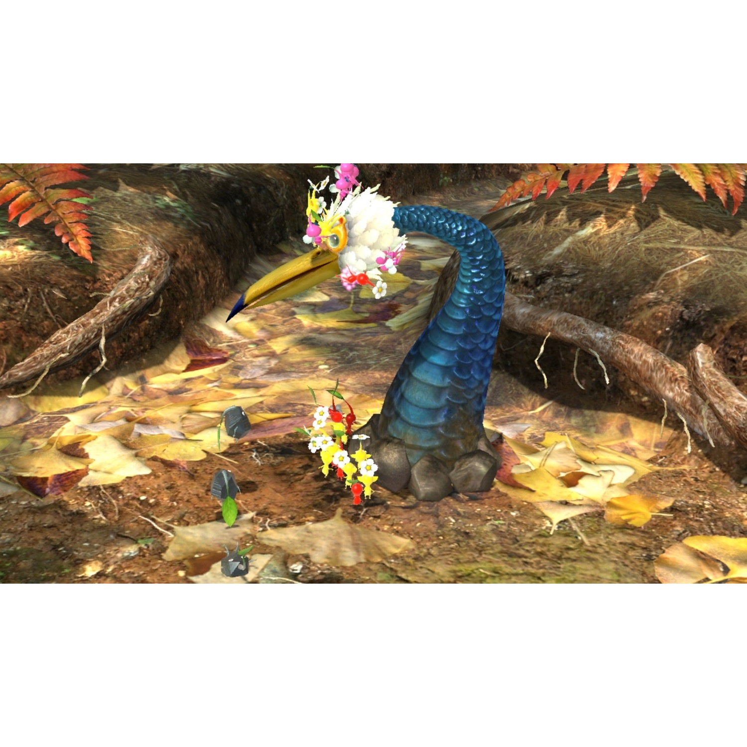 A blue bird with flowers on its head stands on a forest floor covered in leaves.
