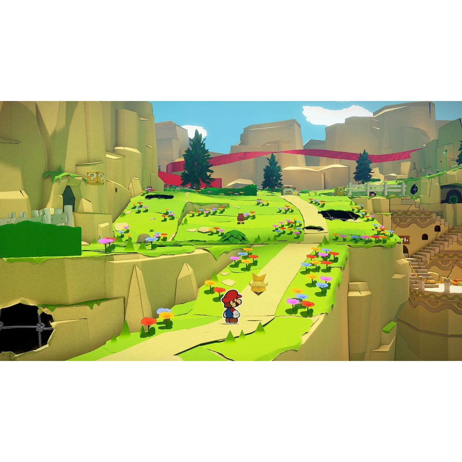 Mario walks on a path through a paper-like landscape with colorful mushrooms.