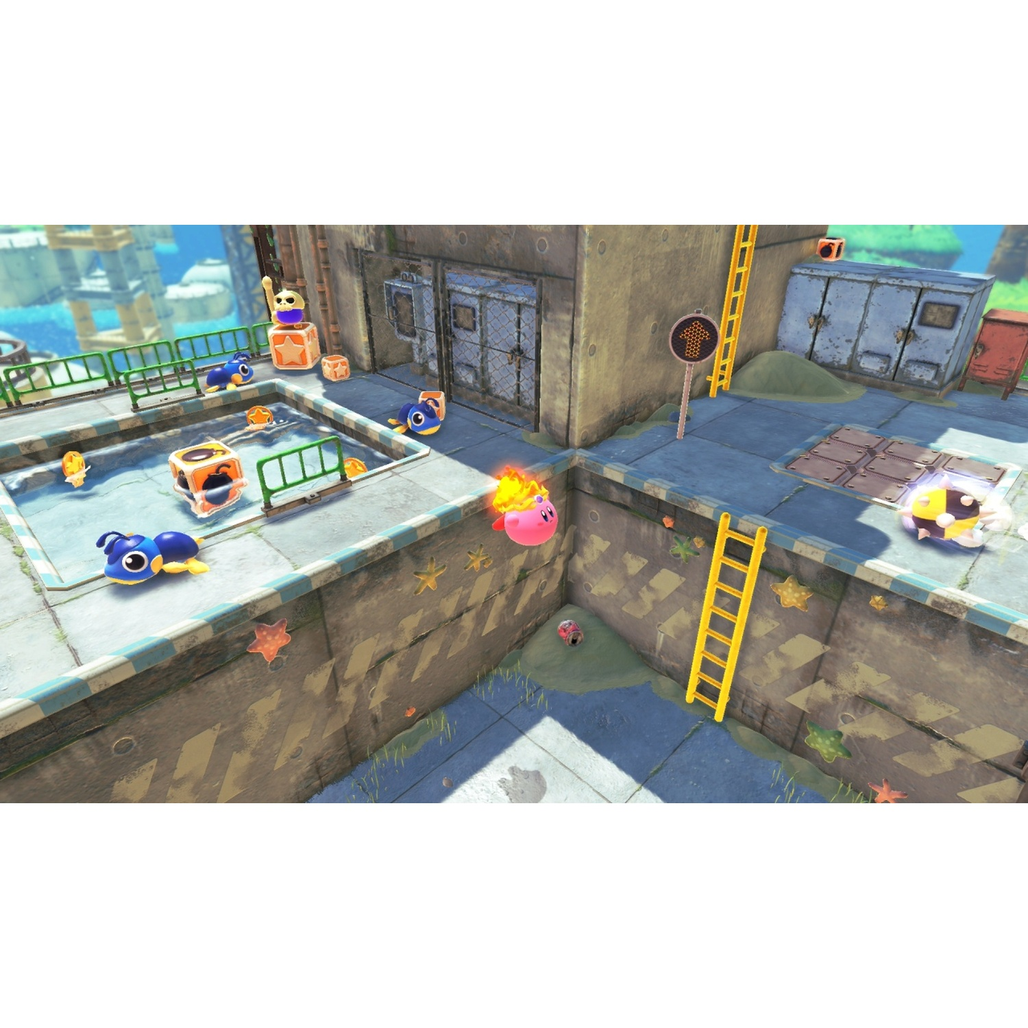 Kirby engulfed in flames, blue creatures, boxes, and a yellow ladder on a concrete platform.