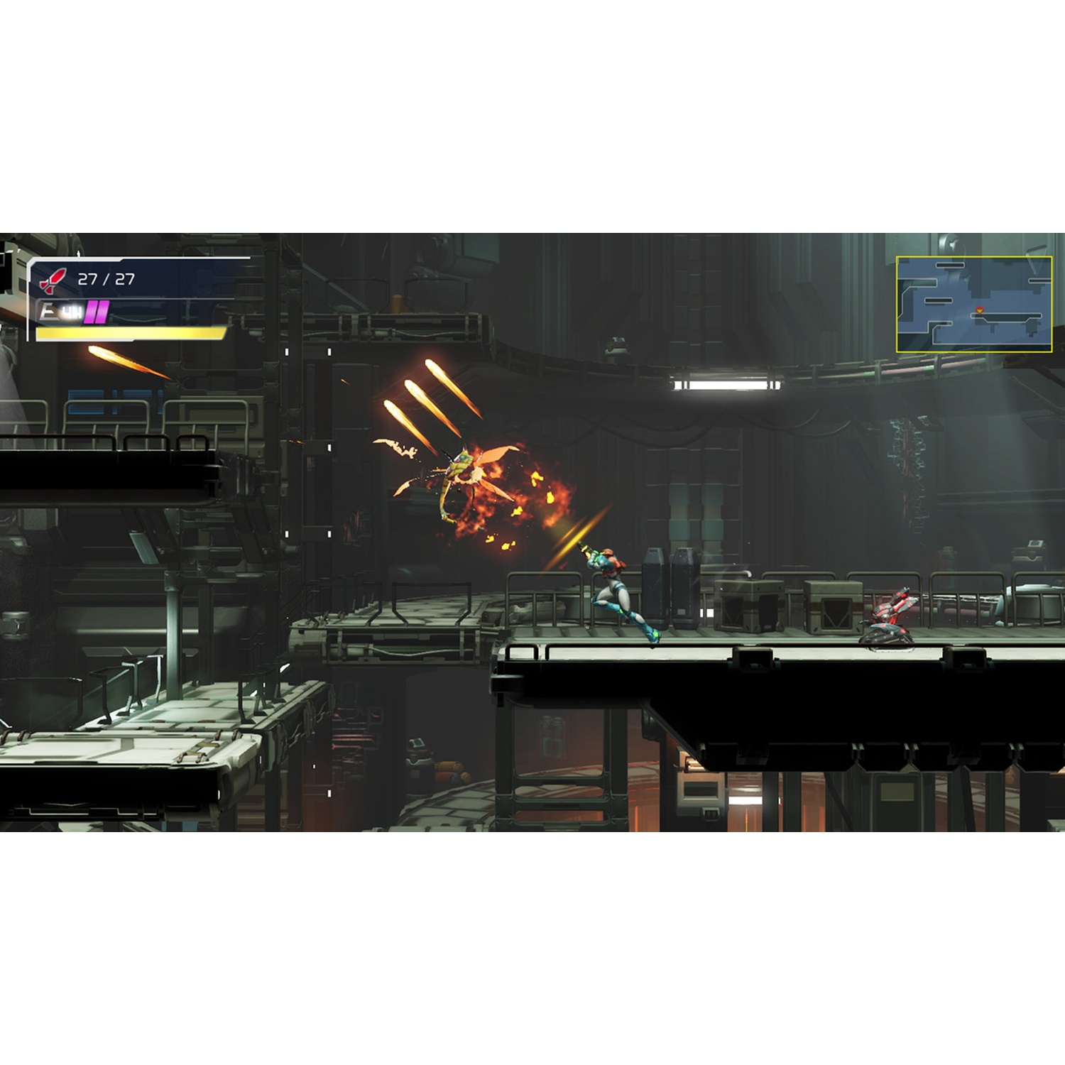 A woman in a blue suit fights an orange creature in a dark factory setting.