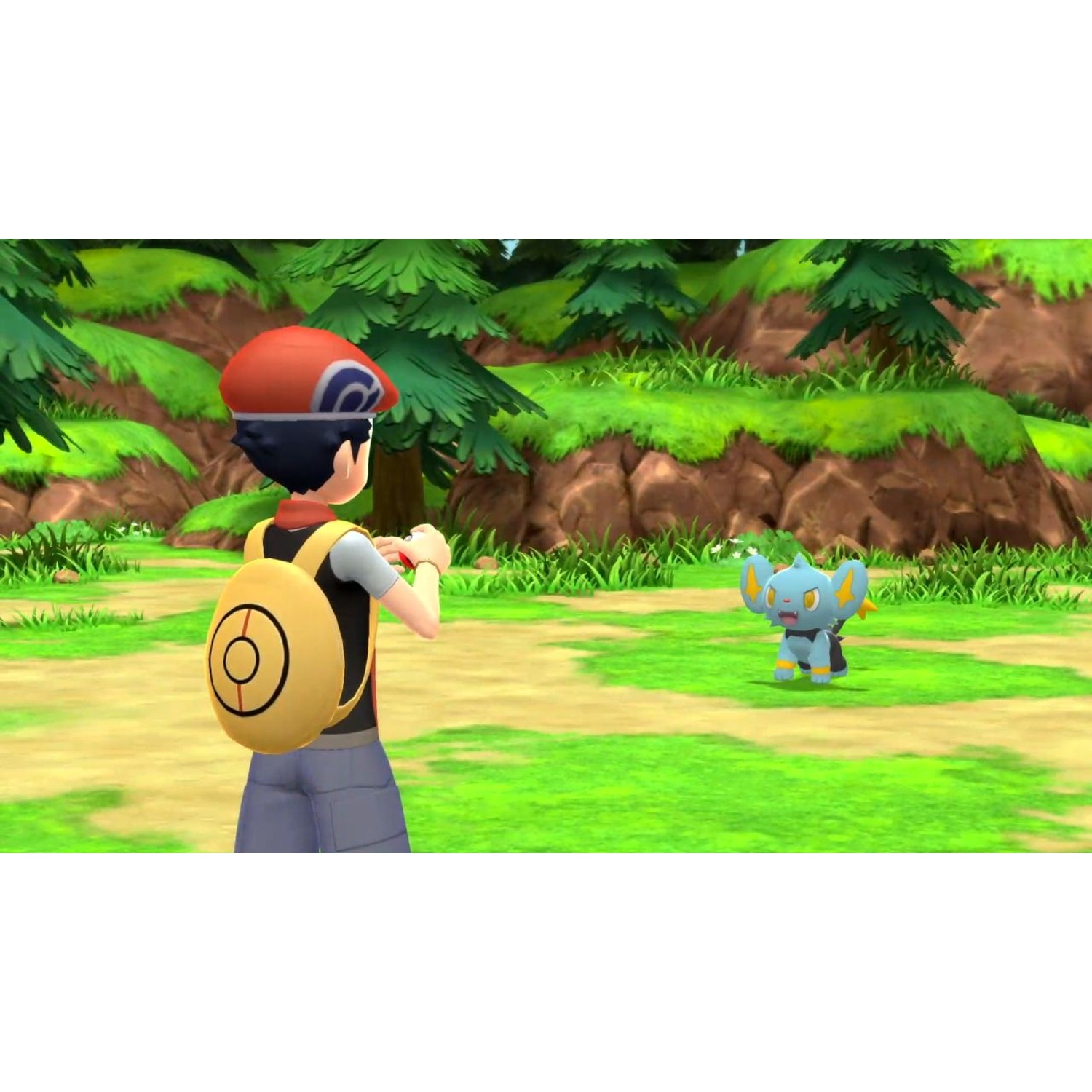 A boy with a backpack faces a small blue Pokémon in a grassy clearing.