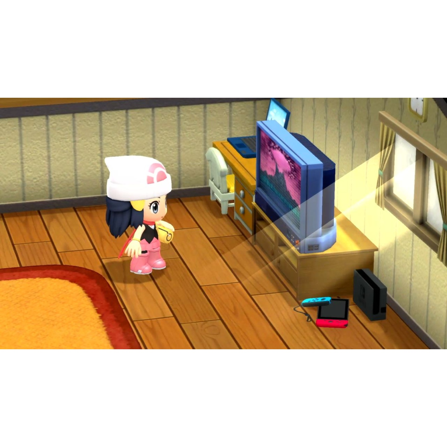 A girl in pink clothes and a white hat stands in front of a TV.